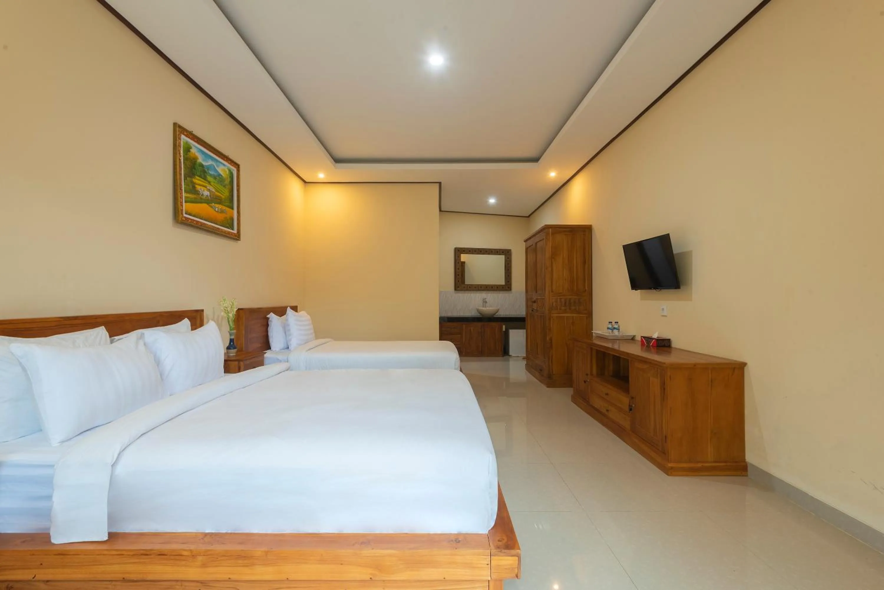 Bed in Liliy Guest House Legian
