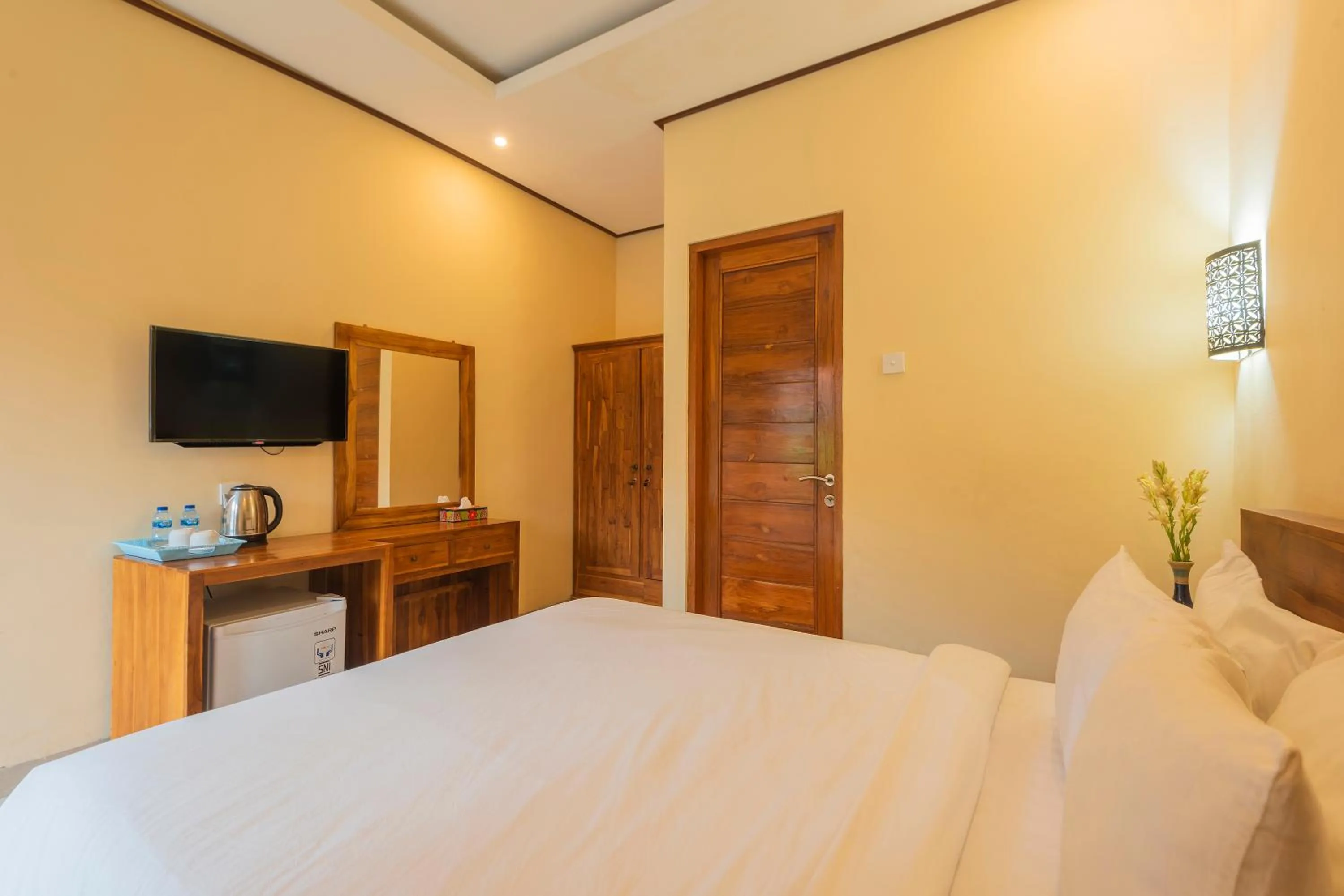 Bed in Liliy Guest House Legian
