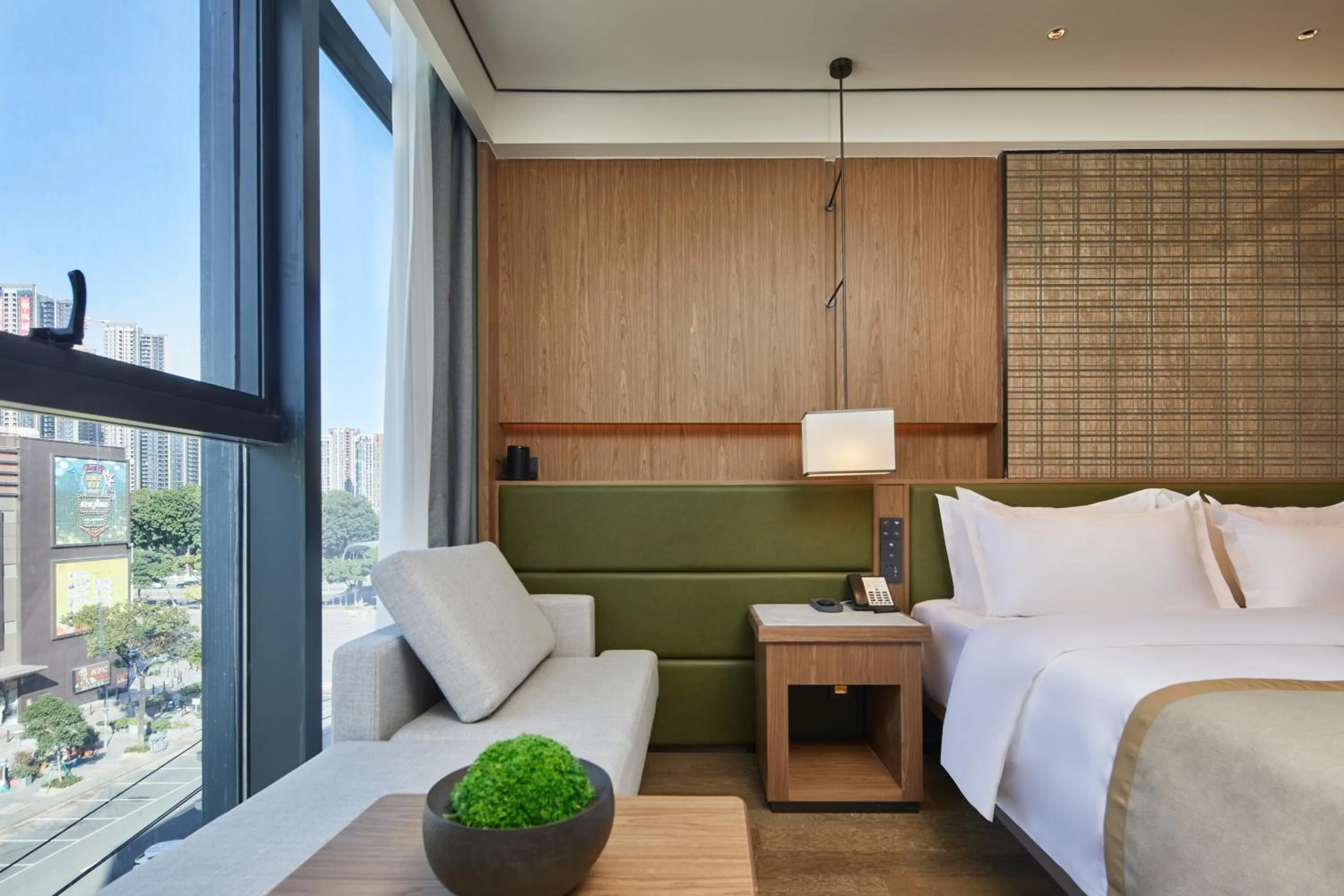 Bed in Dongguan Tangxia Huaman Hotel