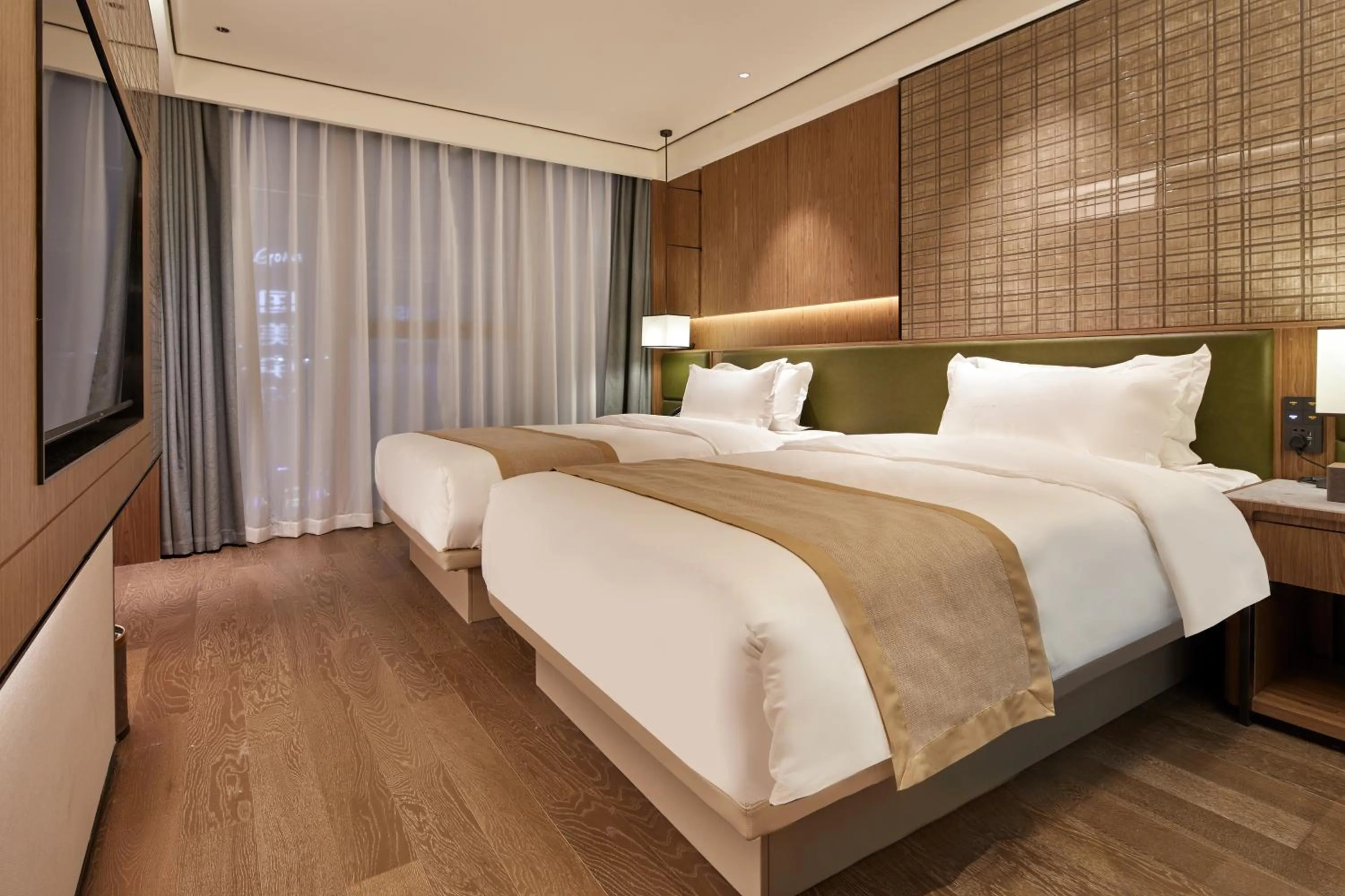 Bed in Dongguan Tangxia Huaman Hotel