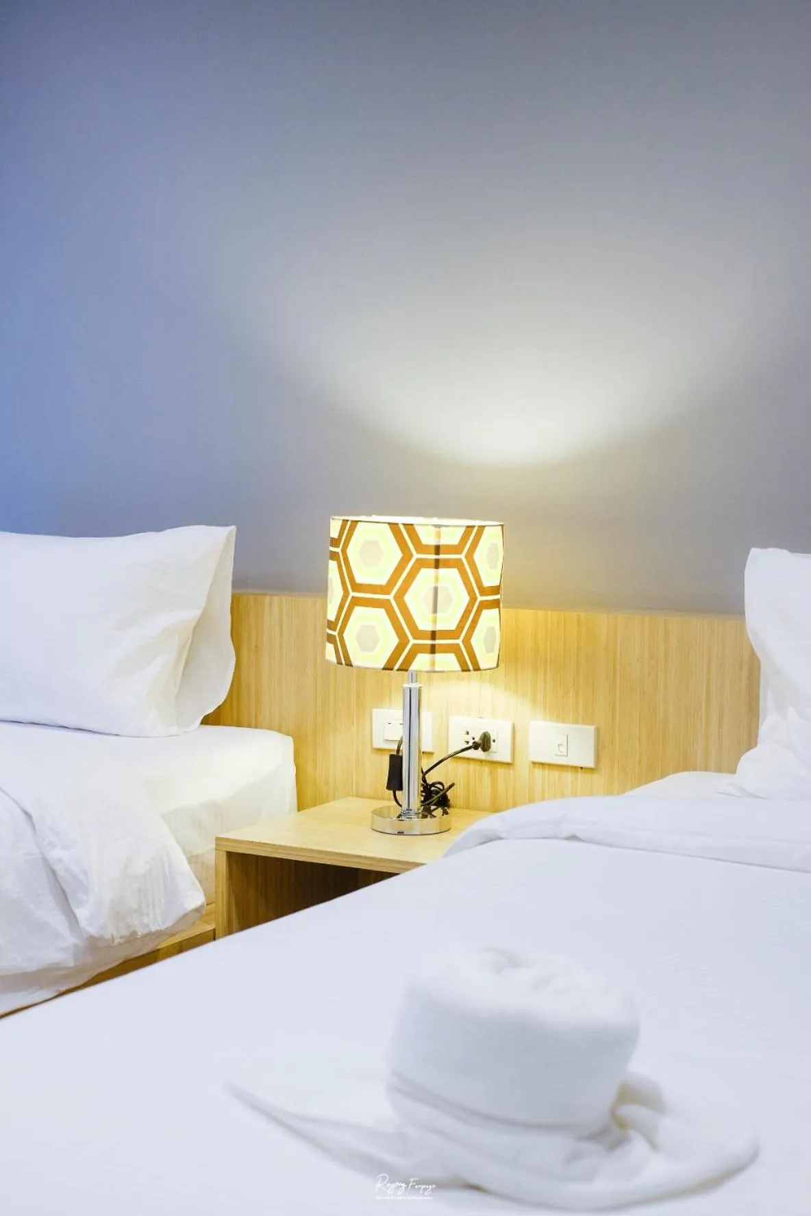 Bed in Klaang Muang Hotel (โรงแรมกลางเมือง)