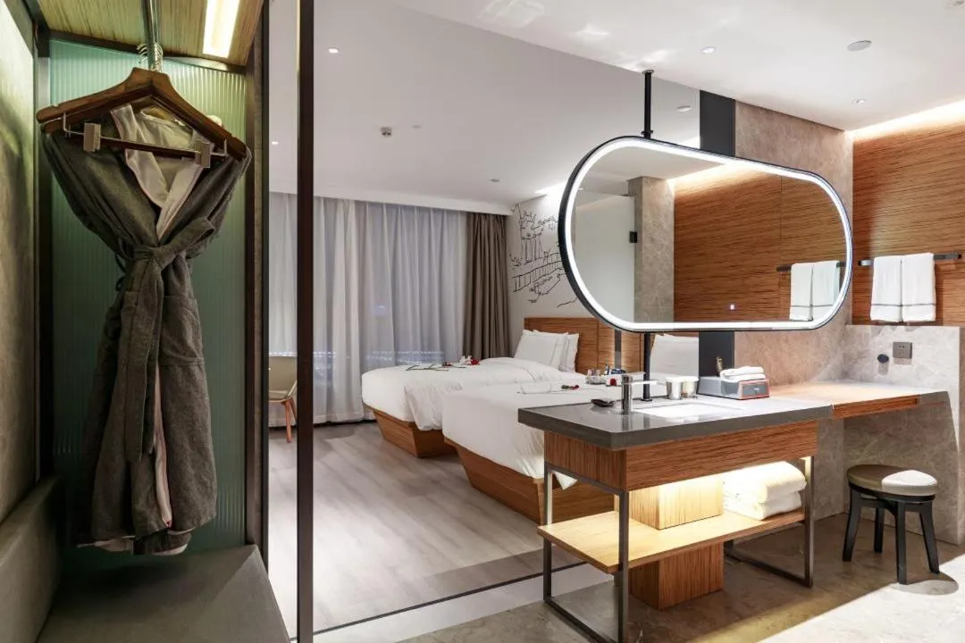 Bed in UrCove by HYATT Nanjing South Railway Station