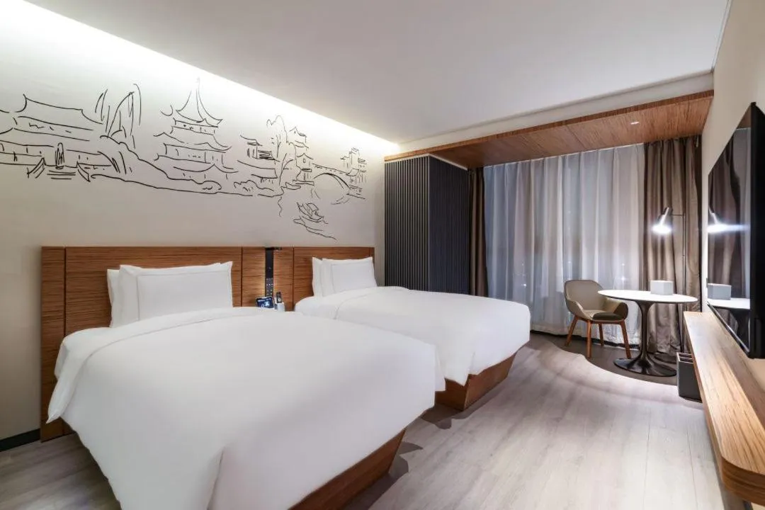 Bed in UrCove by HYATT Nanjing South Railway Station