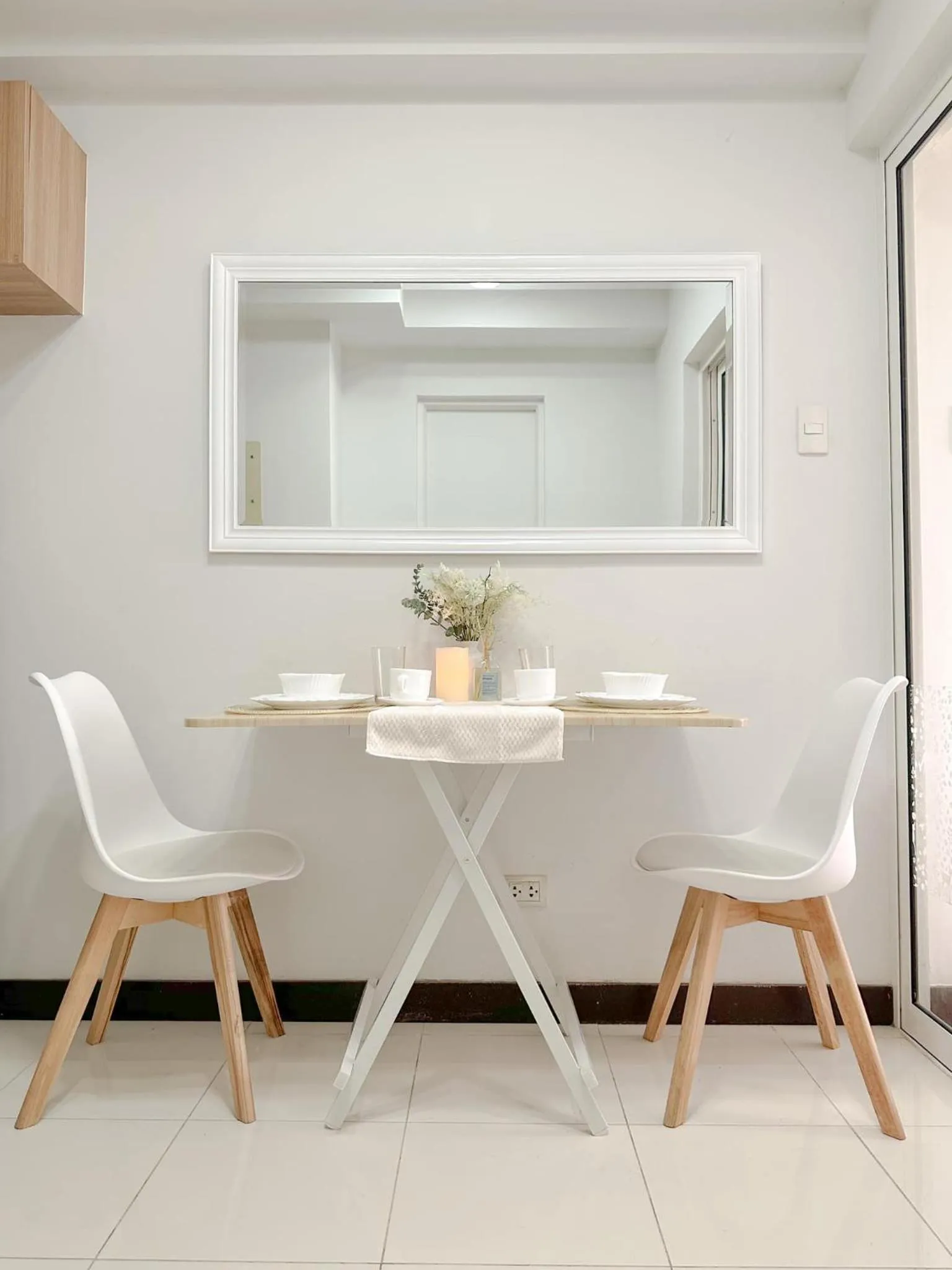 Dining area in Zinnia Towers 1BR Condo with PS4 Karaoke Netflix & Swimming Pool