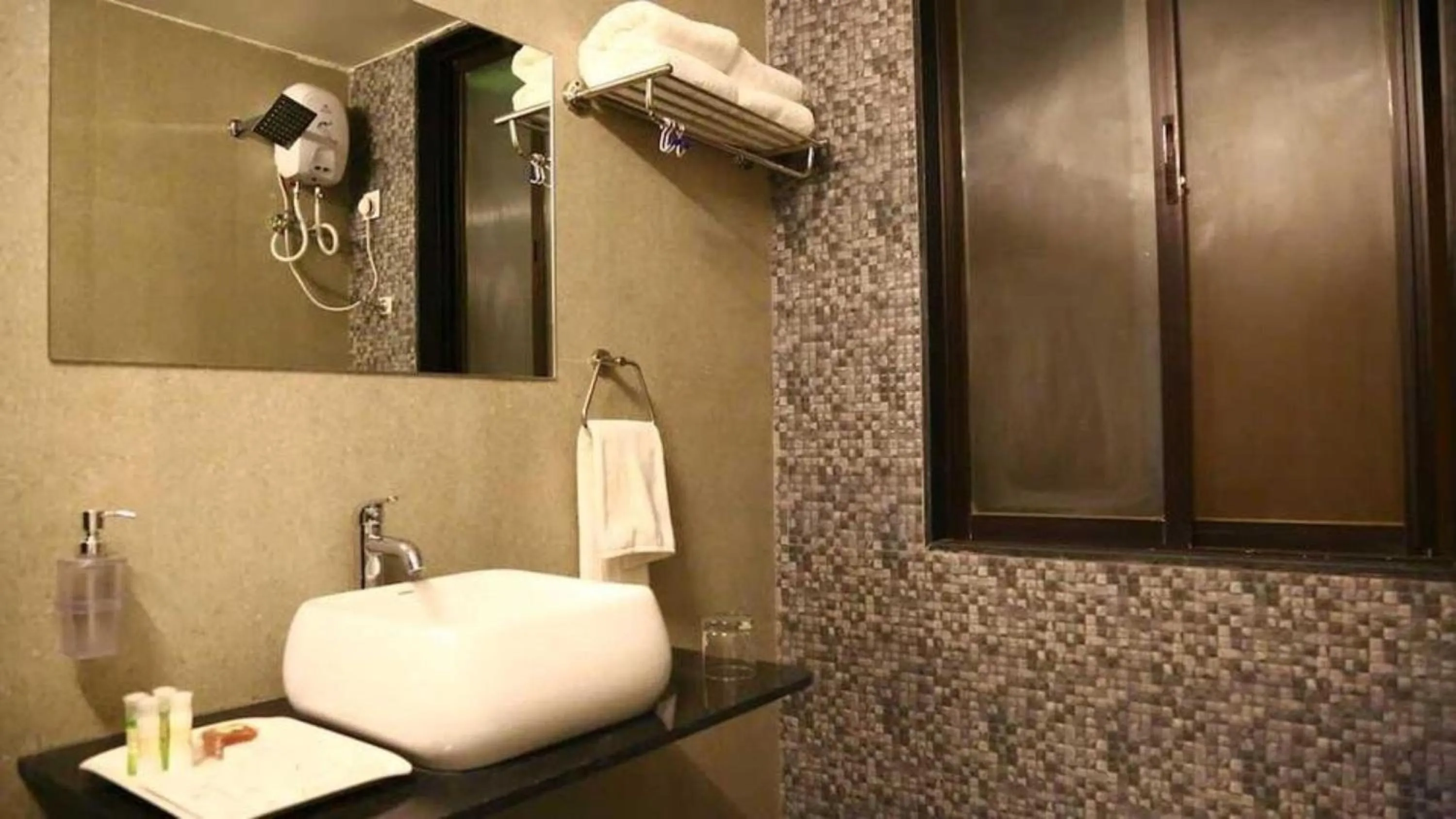 Bathroom in Palette by CheckIn The Royal Castle Resort Rajkot