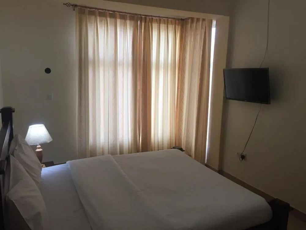 TV and multimedia, Bed in Milimani Resort Kakamega
