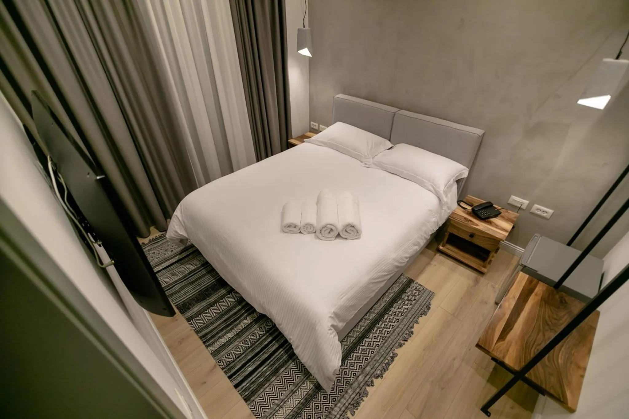 Bed in Elegance Boutique Hotel