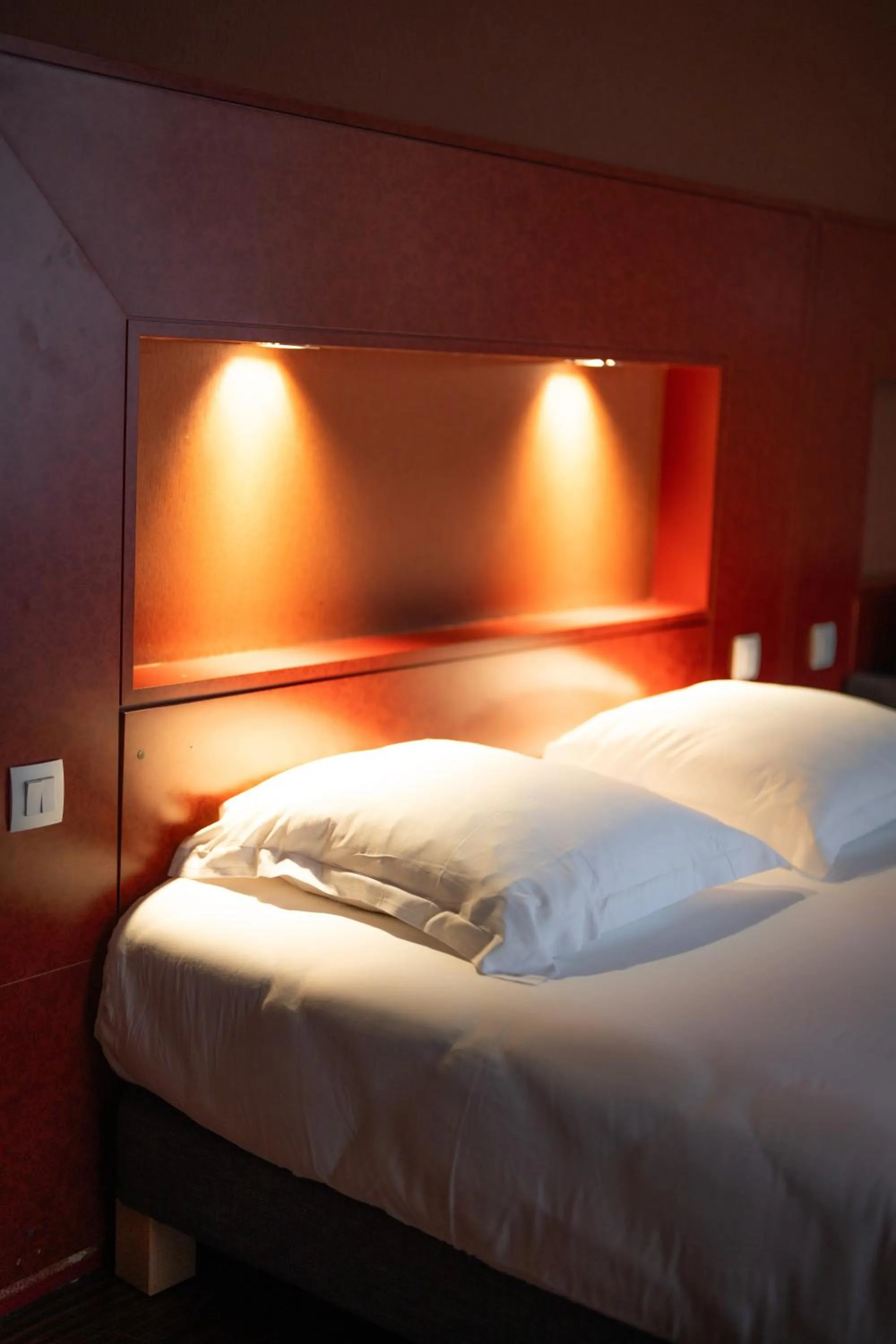 Bed in LA CROIX D'OR LOGIS Hôtels