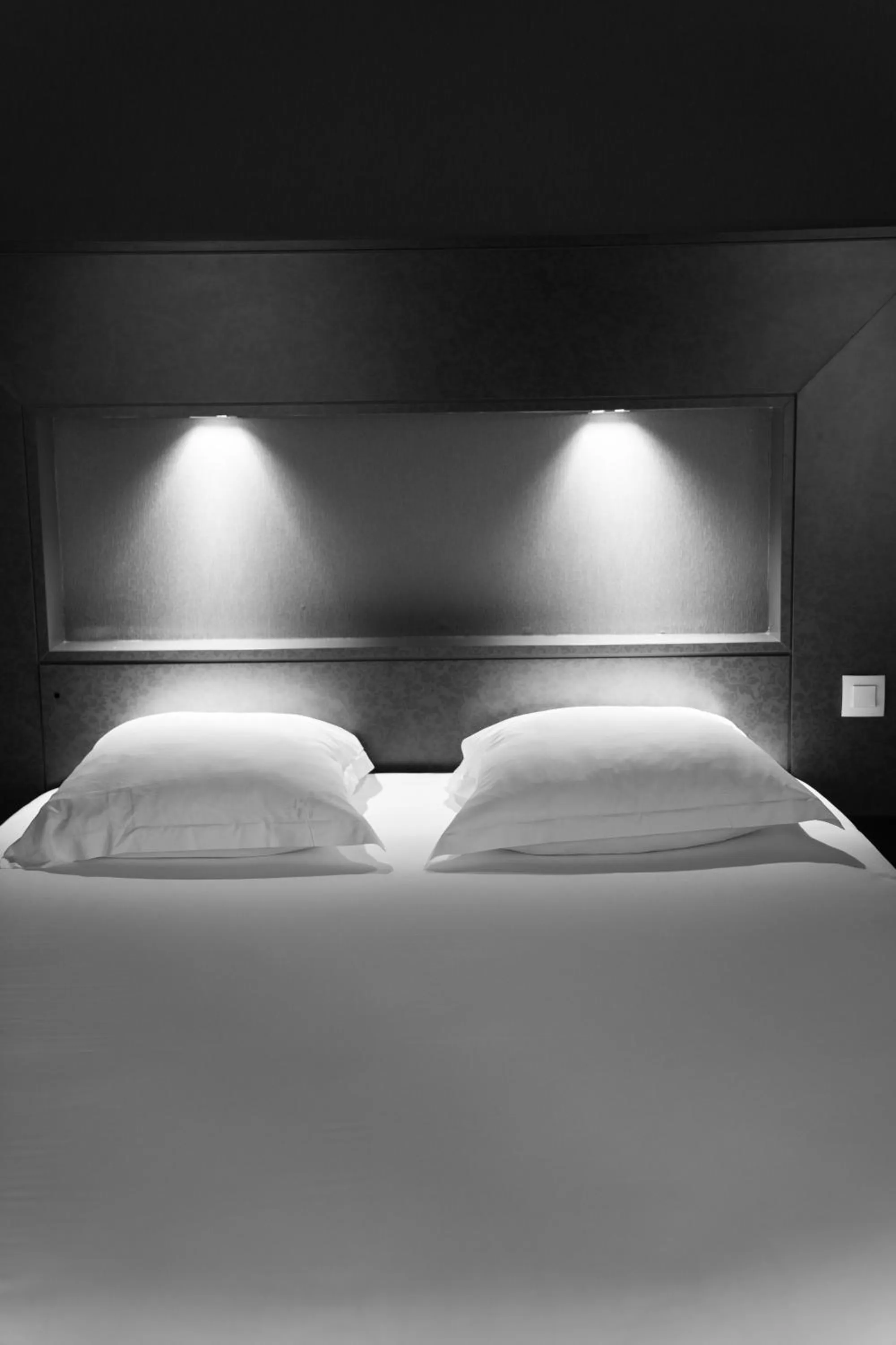 Bed in LA CROIX D'OR LOGIS Hôtels