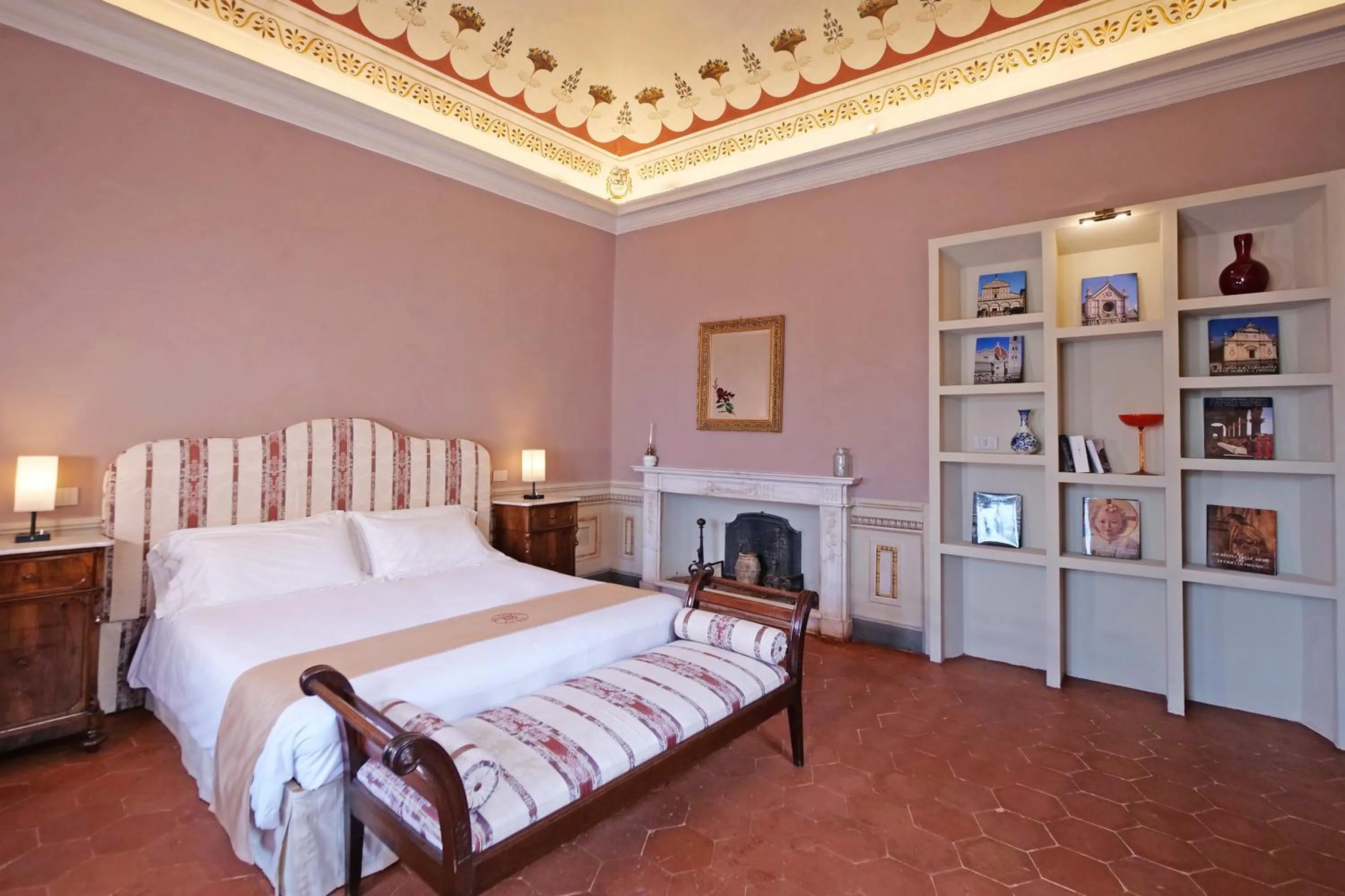 Bed in Delcorto Suites