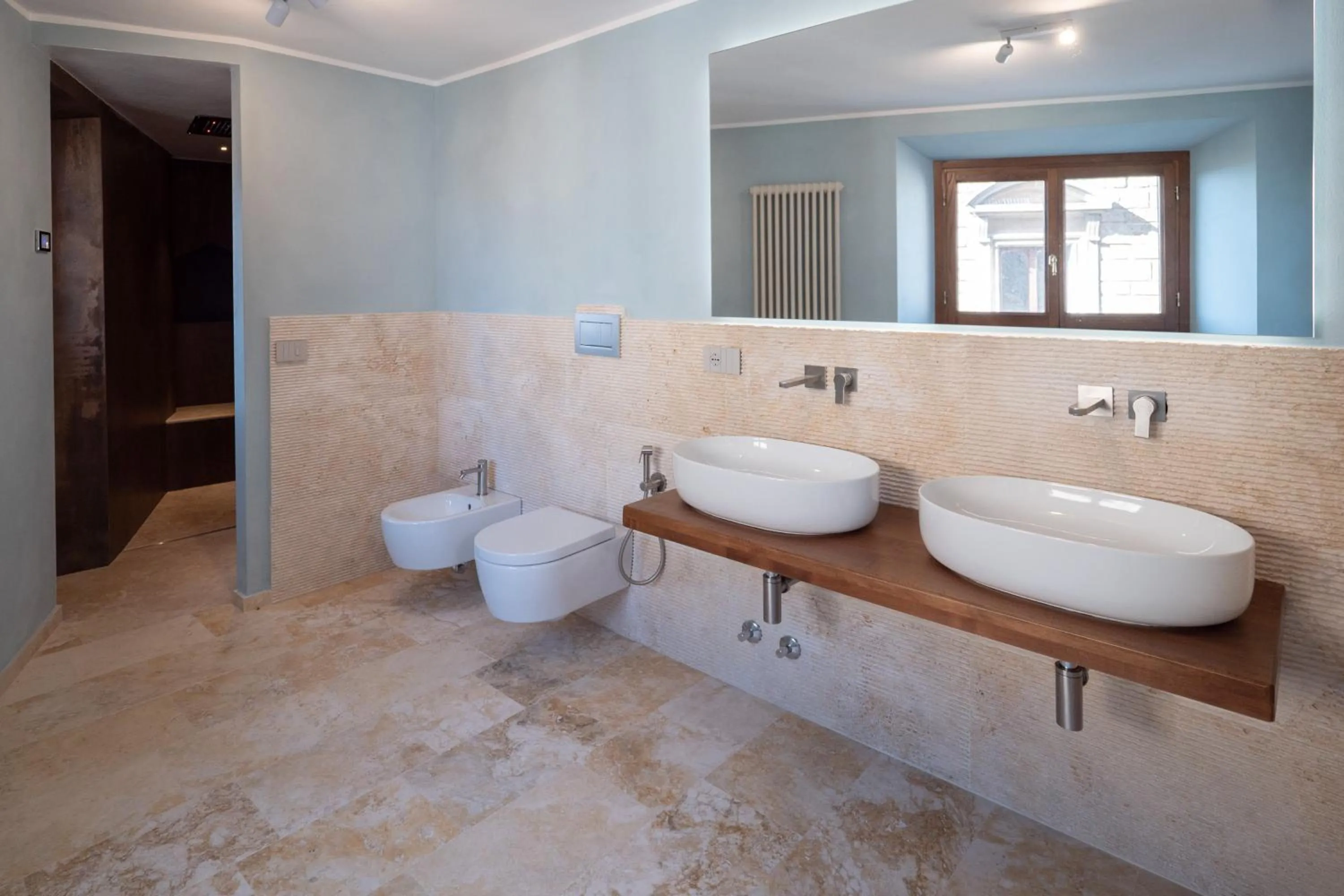 Toilet in Delcorto Suites