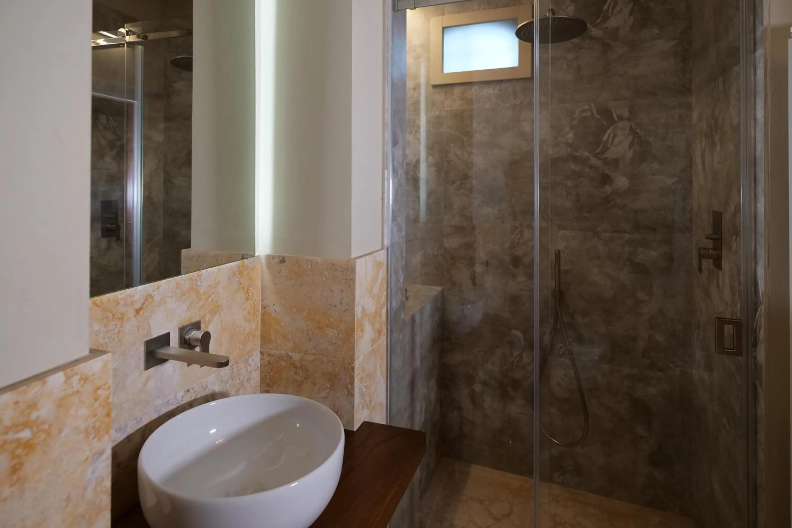 Shower in Delcorto Suites