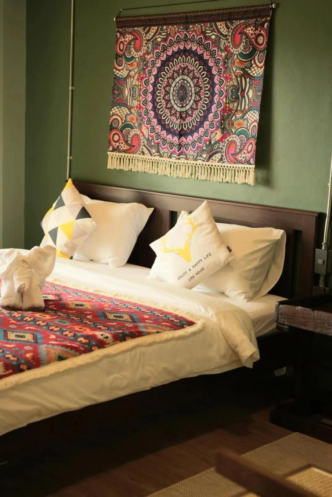 Bed in Elegant Lanna Guesthouse