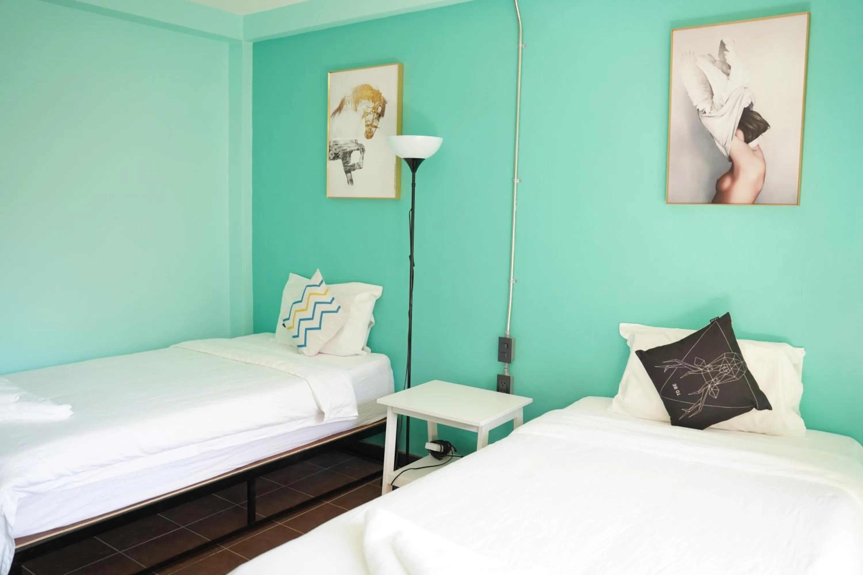 Bed in Elegant Lanna Guesthouse