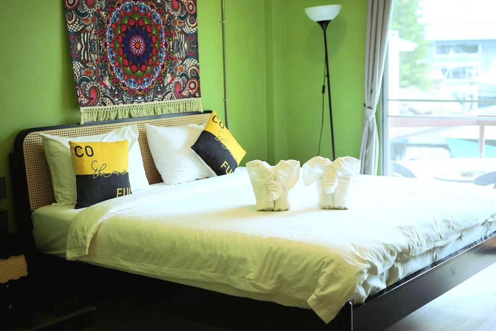 Bed in Elegant Lanna Guesthouse