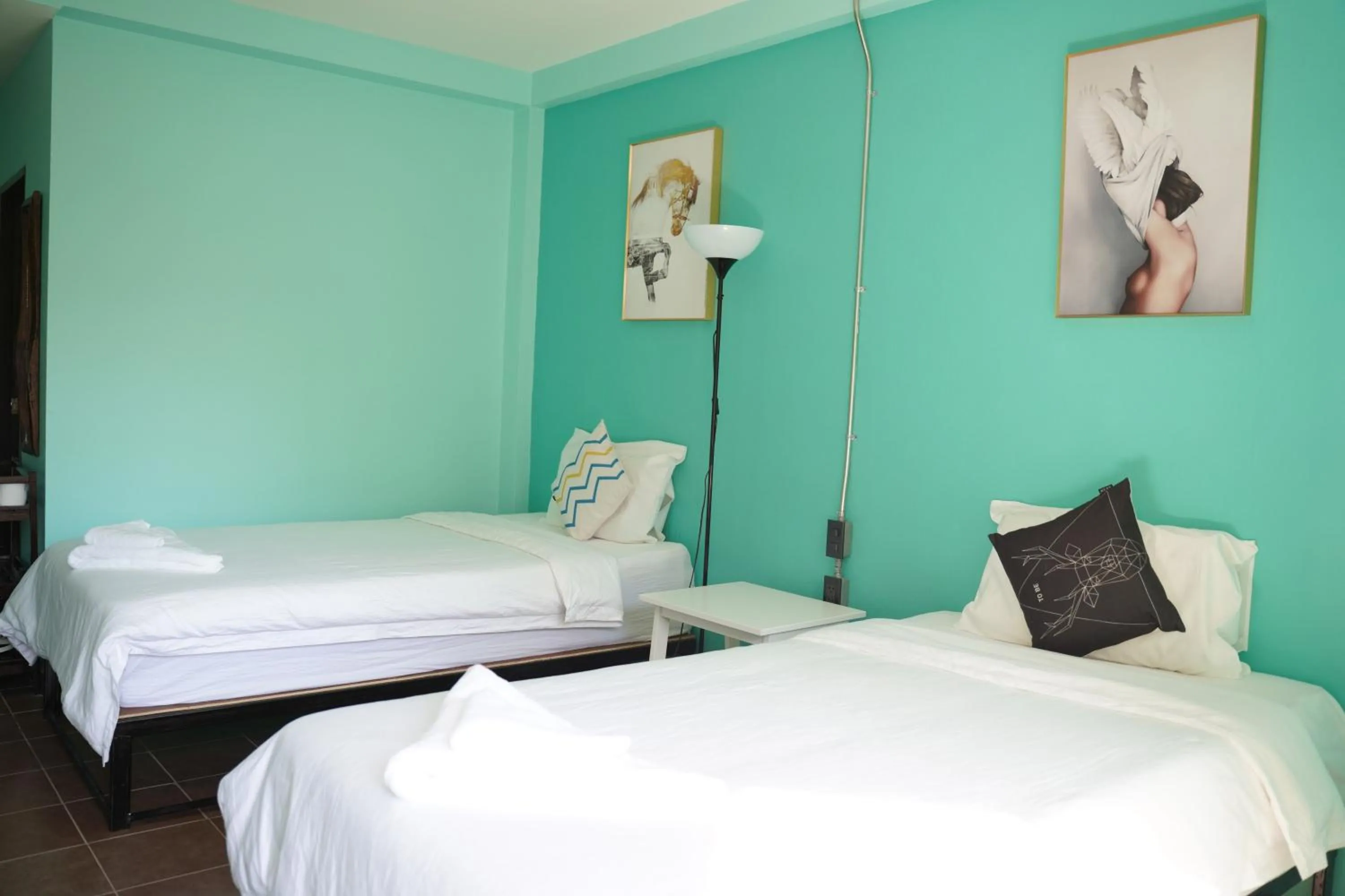 Bed in Elegant Lanna Guesthouse