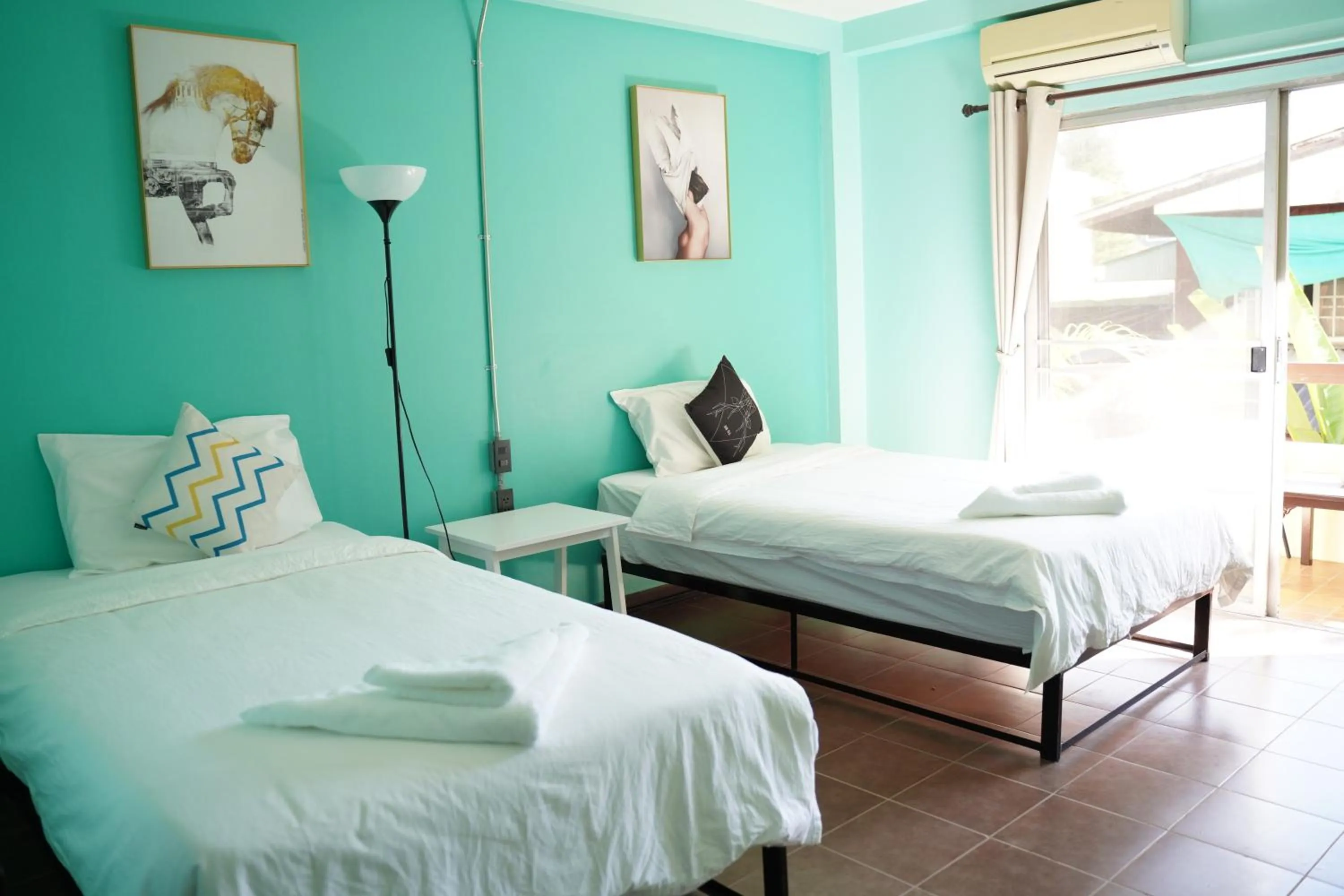 Bed in Elegant Lanna Guesthouse