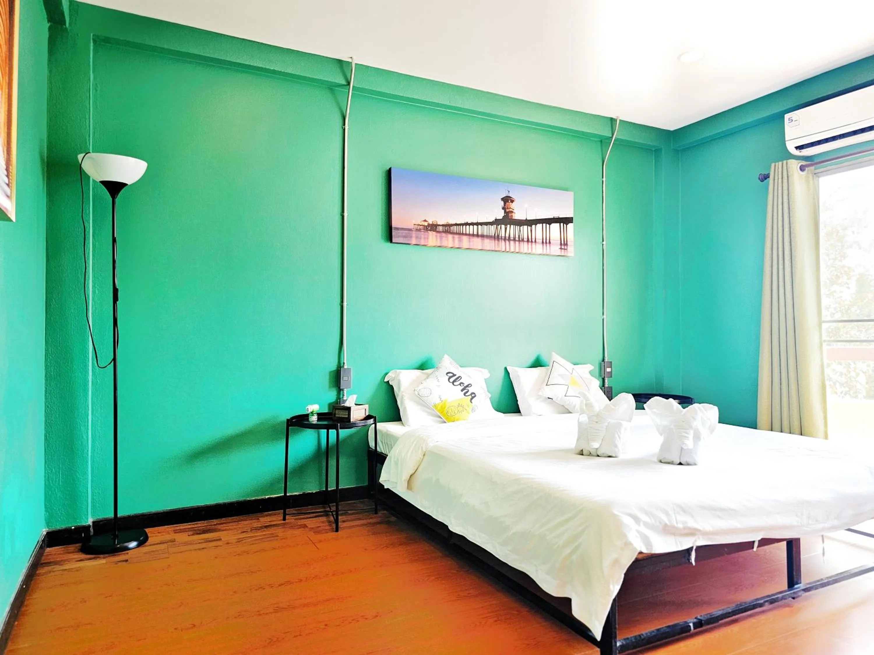 Bed in Elegant Lanna Guesthouse