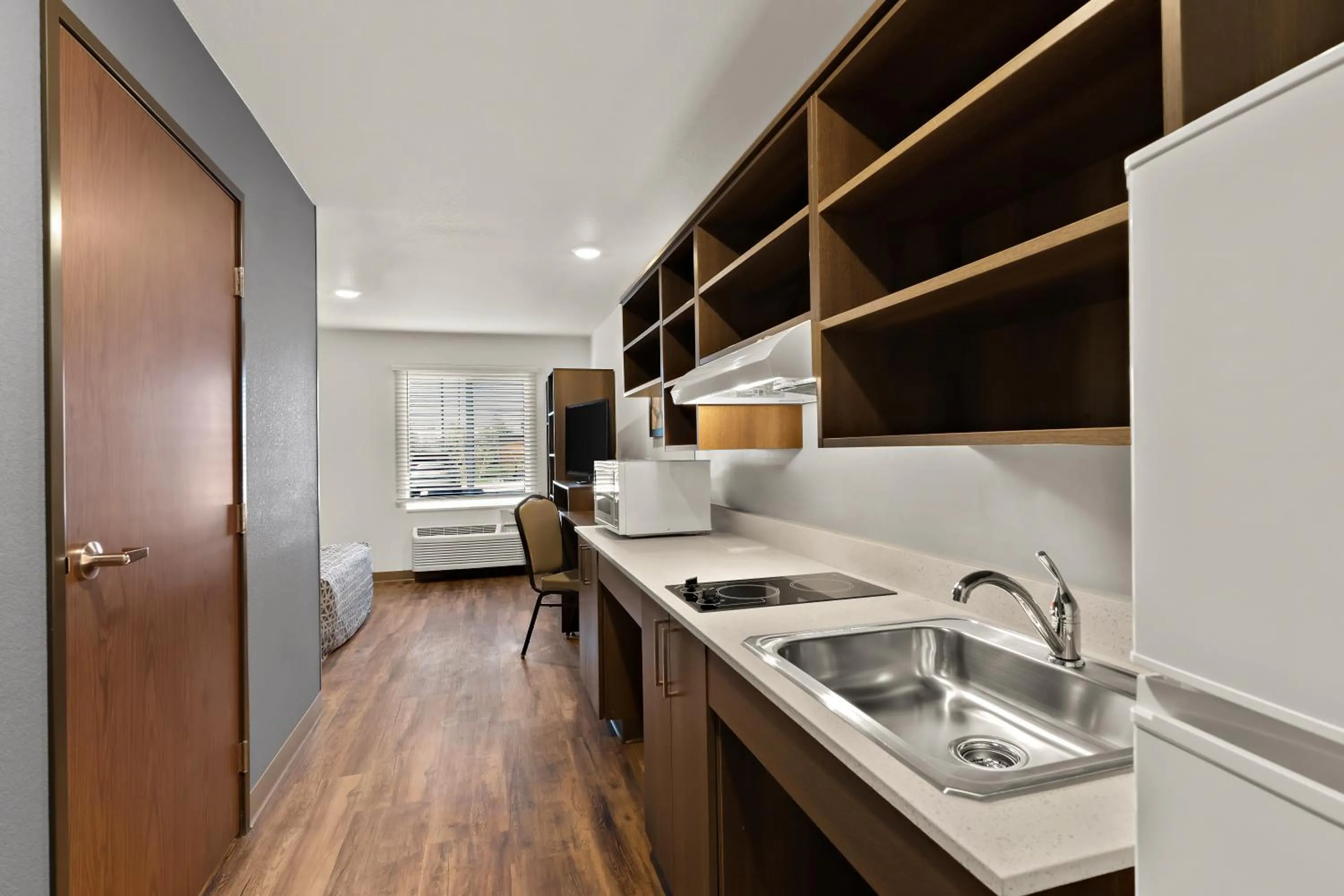 Kitchen or kitchenette in WoodSpring Suites Fort Collins