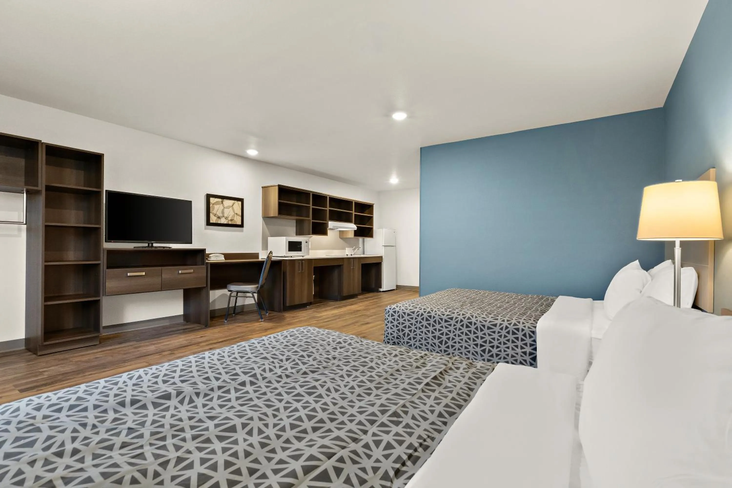 Bedroom, Bed in WoodSpring Suites Fort Collins