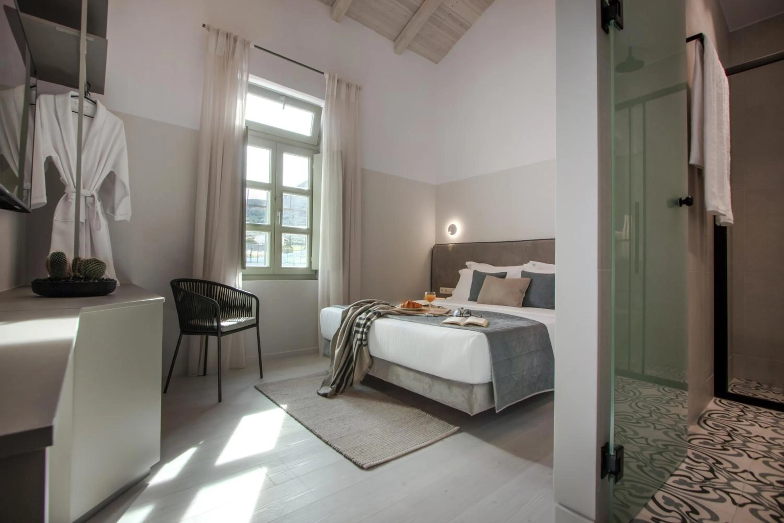 Bed in Octavia Rooms