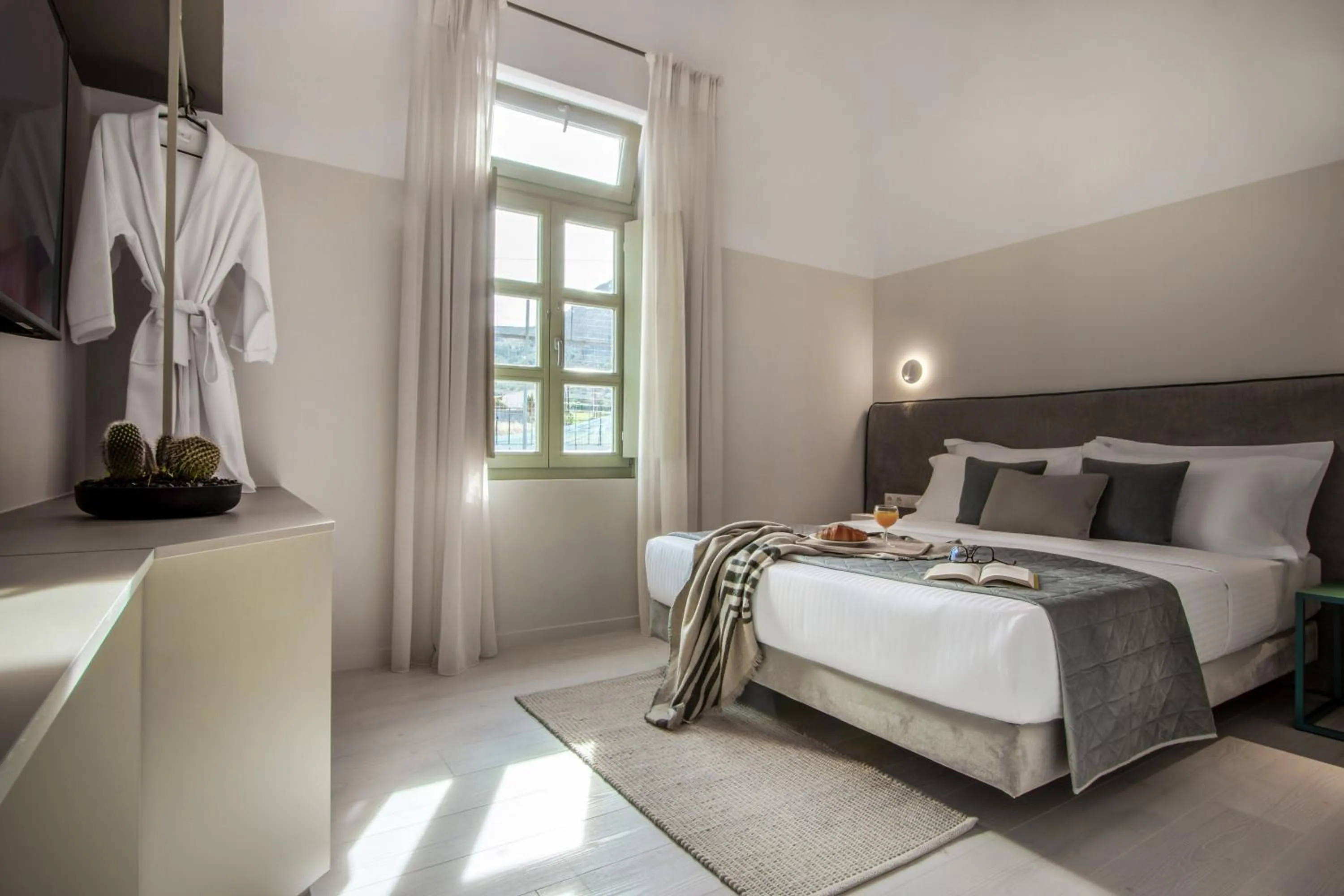 Bed in Octavia Rooms