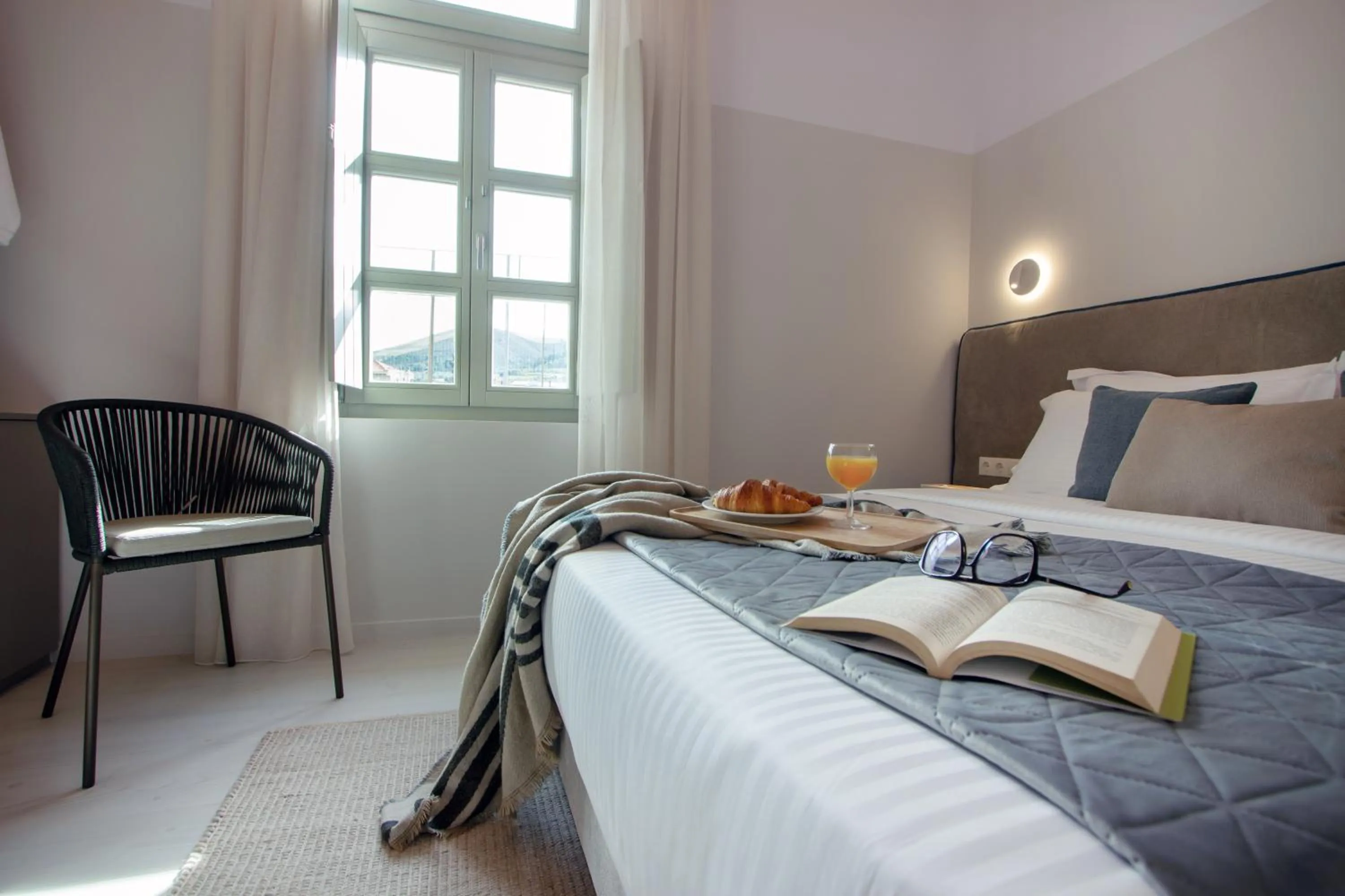 Bed in Octavia Rooms