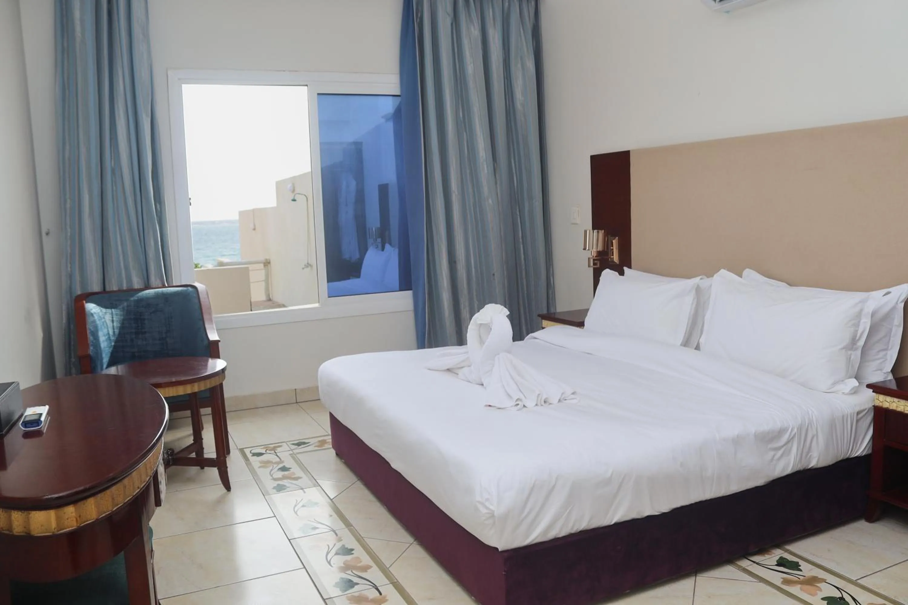 Bed in Radwa Ramada Resort