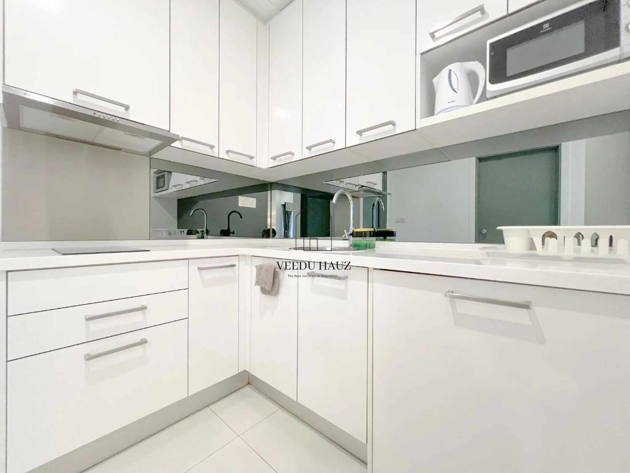 Kitchen or kitchenette in Mercu Summer Suites KLCC by Veedu Hauz