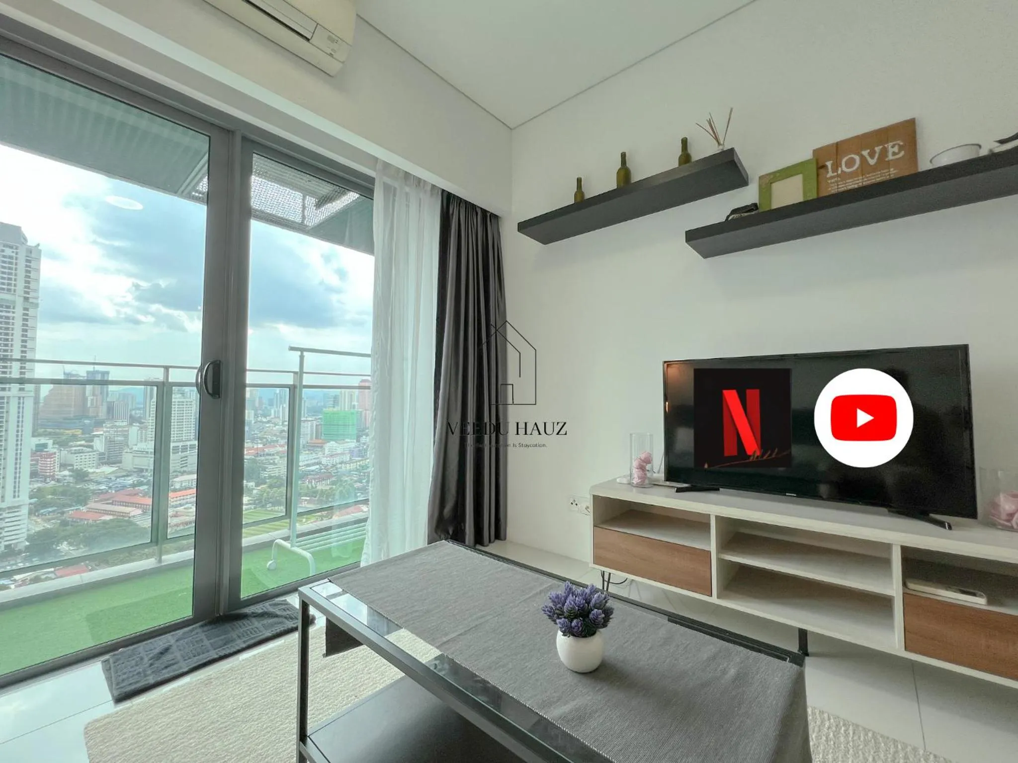 Communal lounge/ TV room in Mercu Summer Suites KLCC by Veedu Hauz