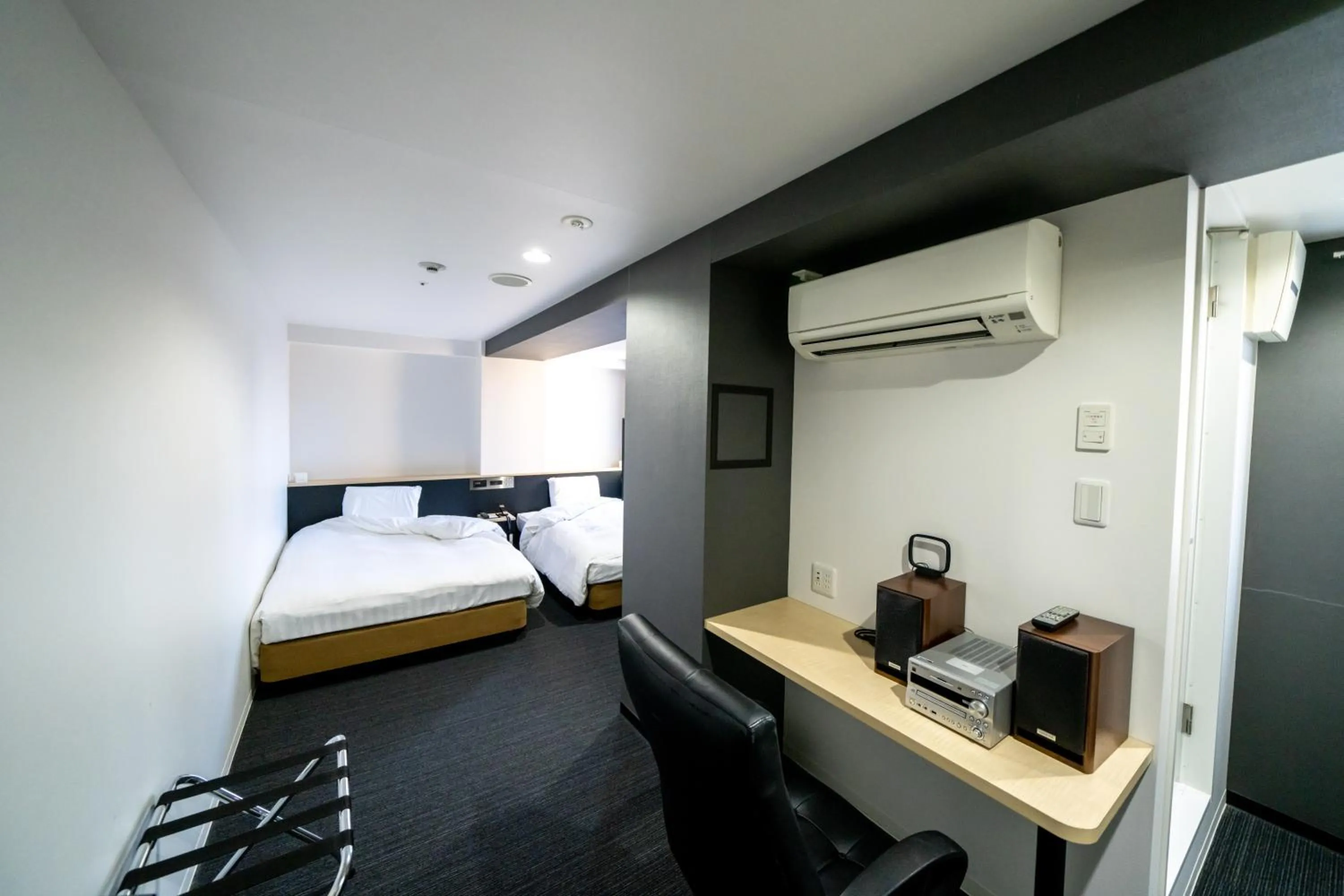 Photo of the whole room, Bed in Ramada Encore by Wyndham Amagasaki