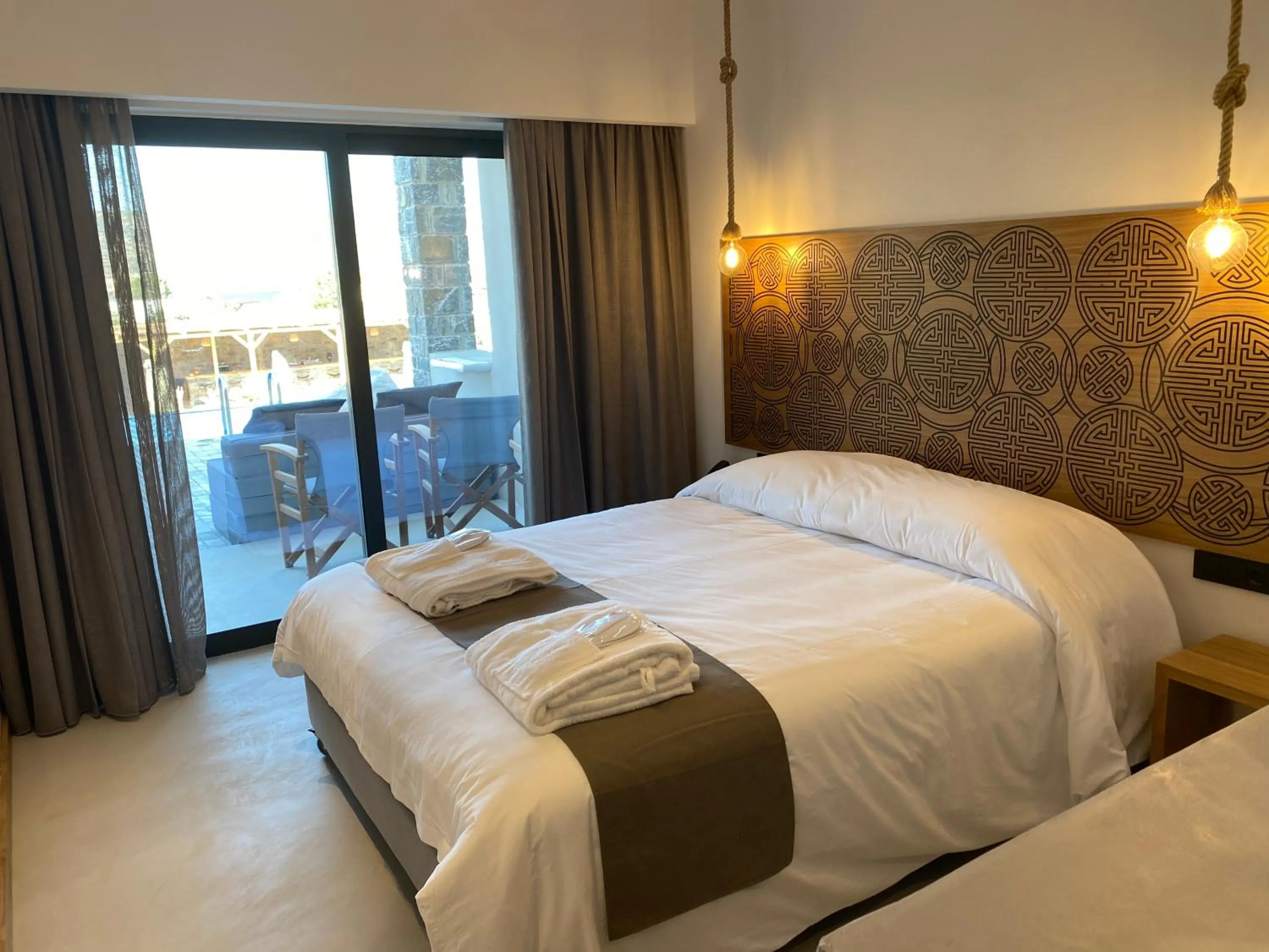 Bed in Helios Beach Hotel & Bungalows