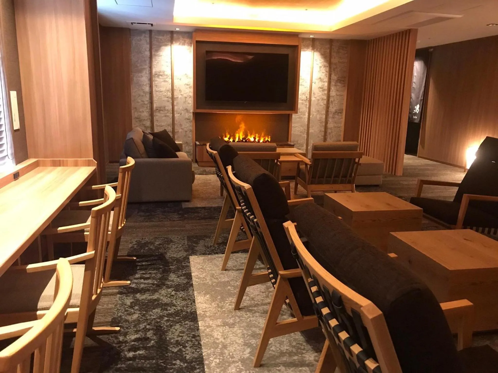 Communal lounge/ TV room in Welina Hotel Premier Nakanoshima West