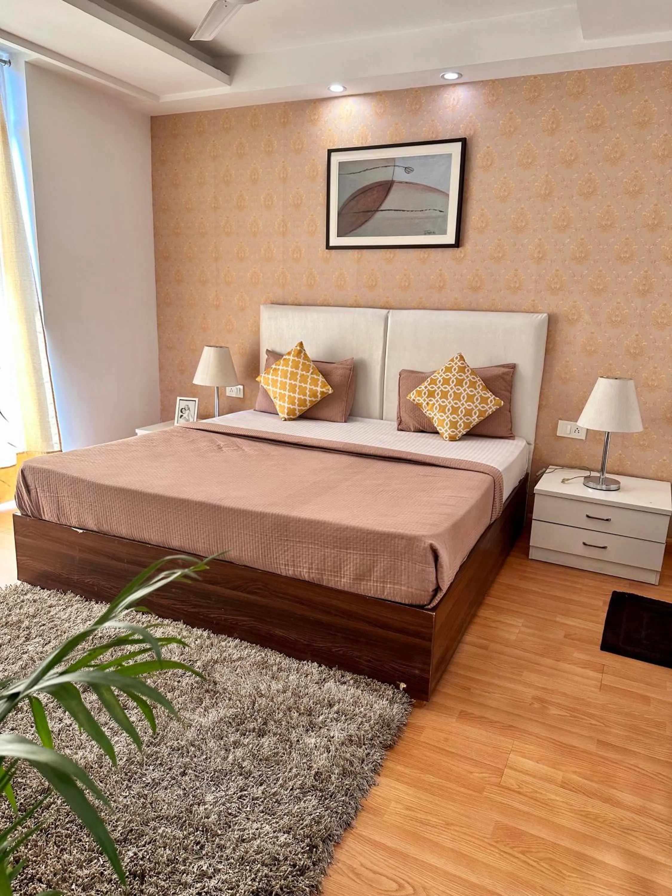Bed in Flamingo Hotel Sector 67 I Studio Rooms I Gurgaon