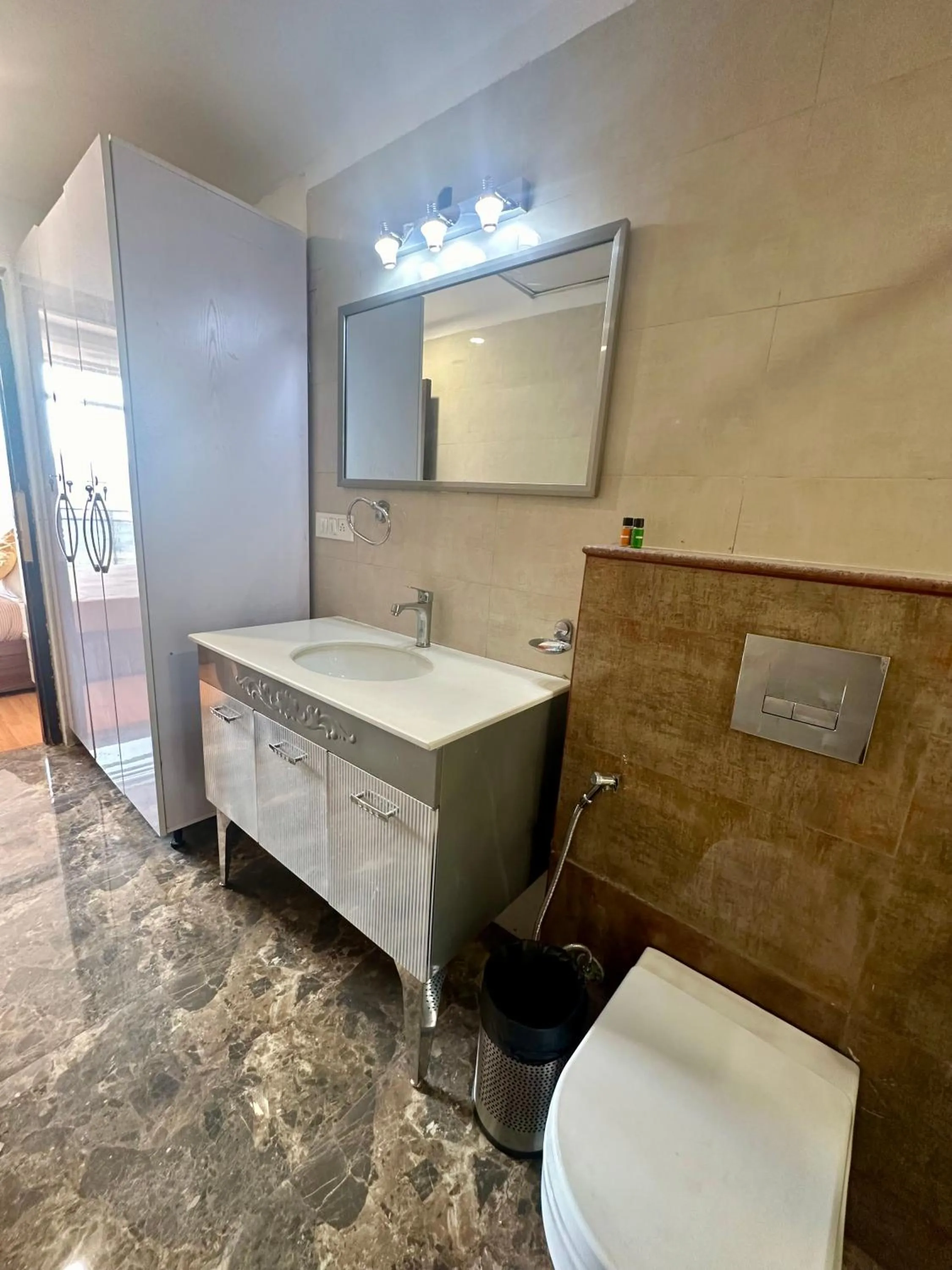 Toilet in Flamingo Hotel Sector 67 I Studio Rooms I Gurgaon