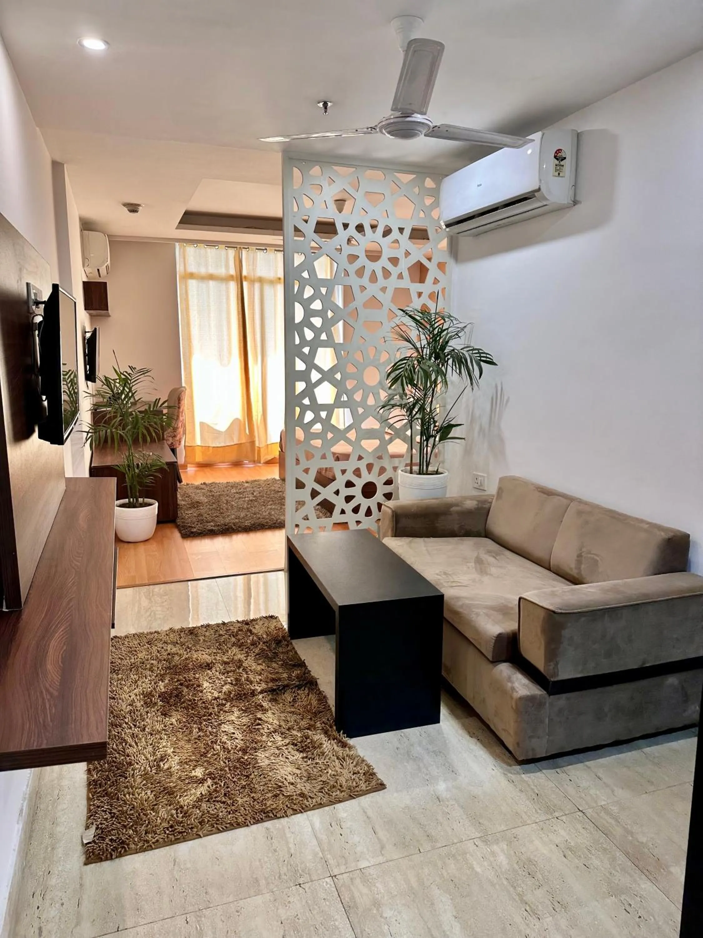 Communal lounge/ TV room in Flamingo Hotel Sector 67 I Studio Rooms I Gurgaon