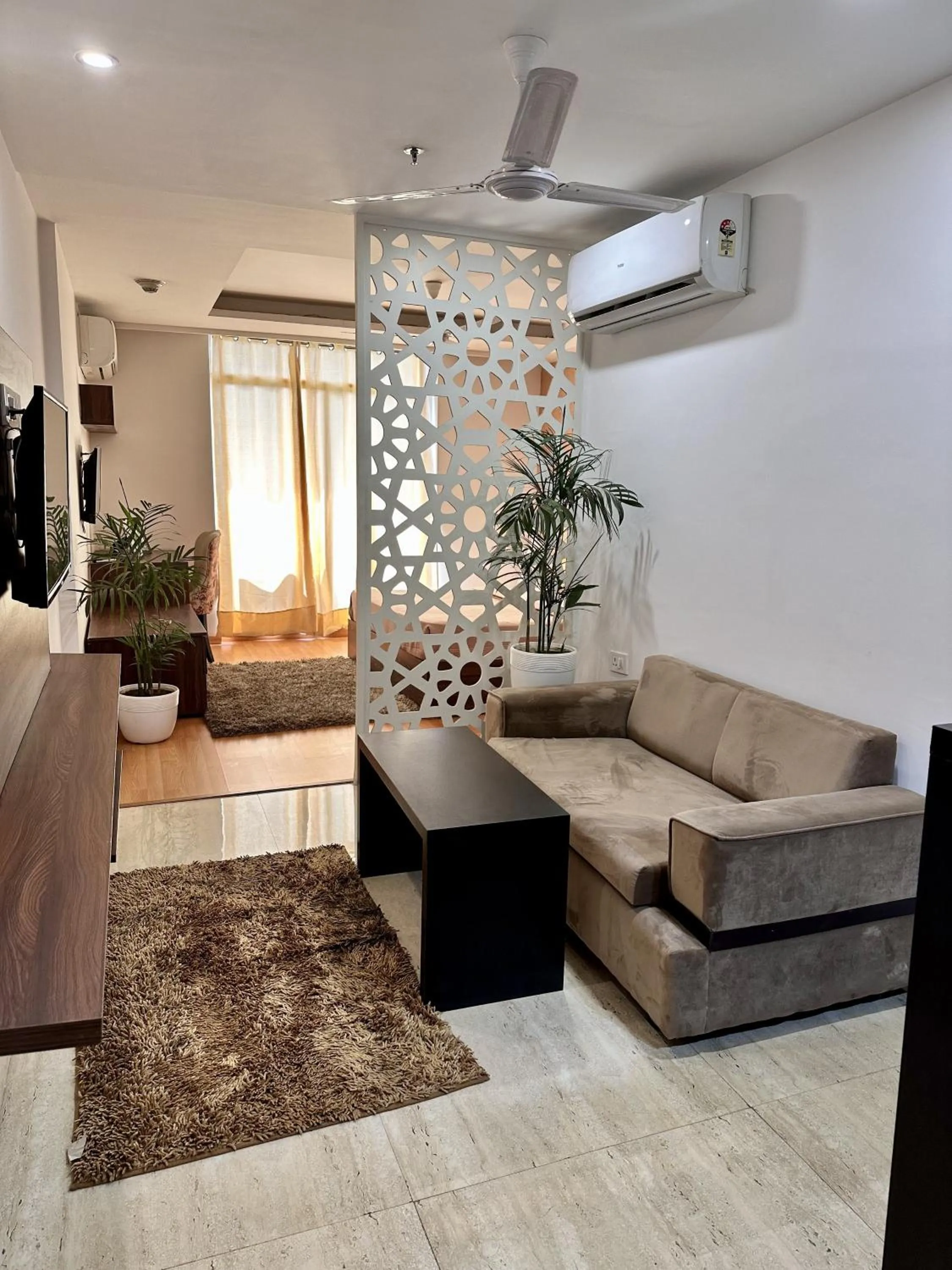 Seating area in Flamingo Hotel Sector 67 I Studio Rooms I Gurgaon