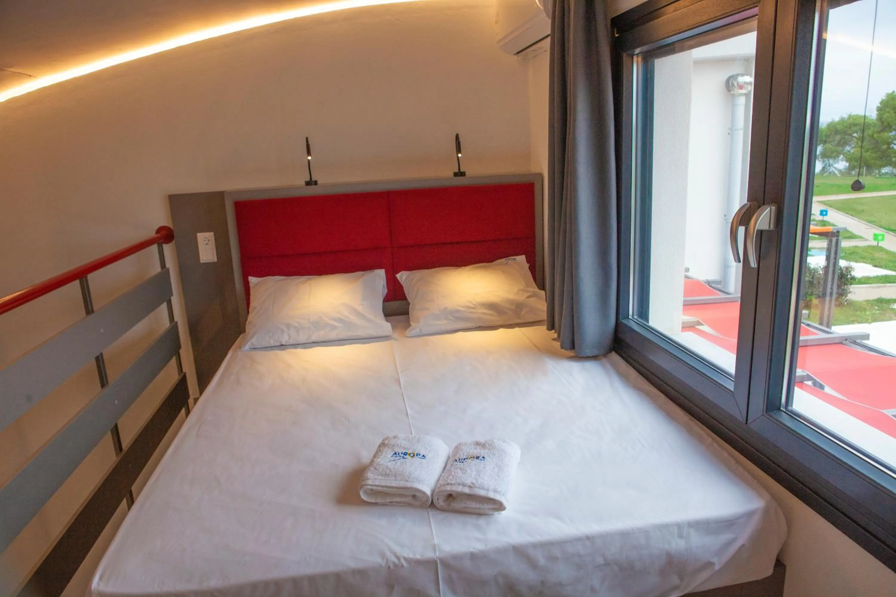 Bedroom, Bed in Aurora Suites