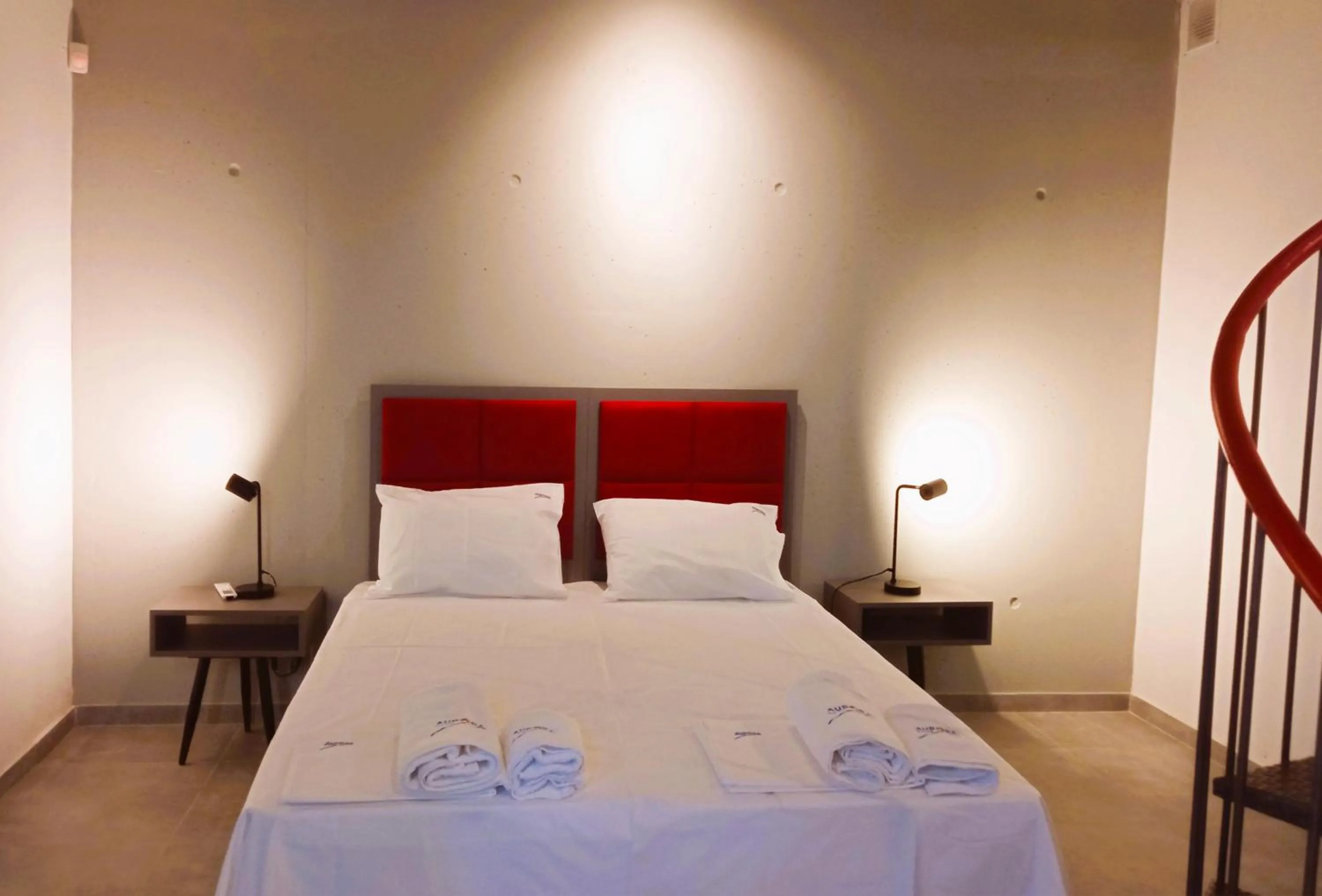 Bed in Aurora Suites