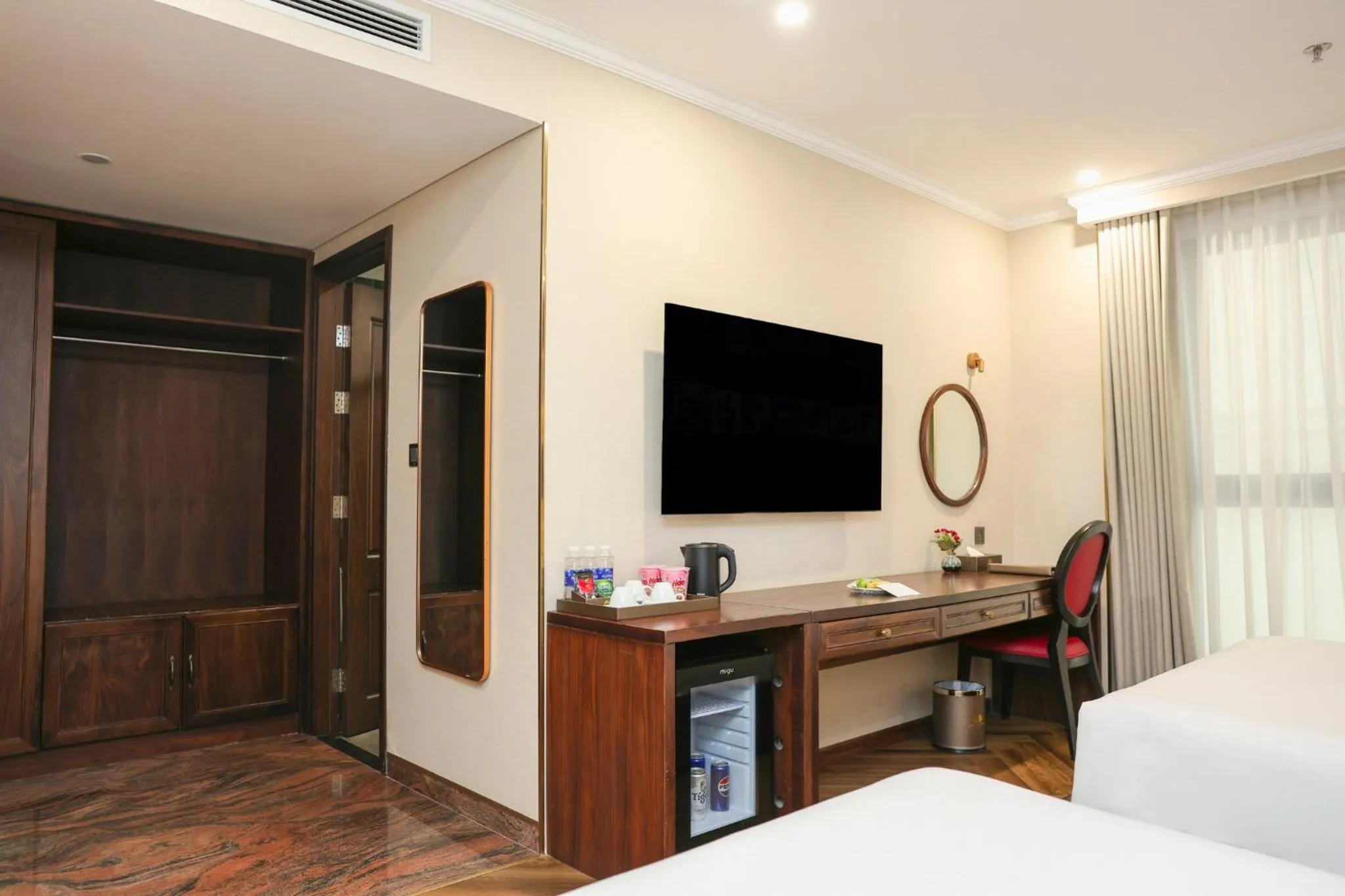 TV and multimedia, Bed in Golden Lotus Luxury Hotel Danang - Complimentary Daily Afternoon Tea