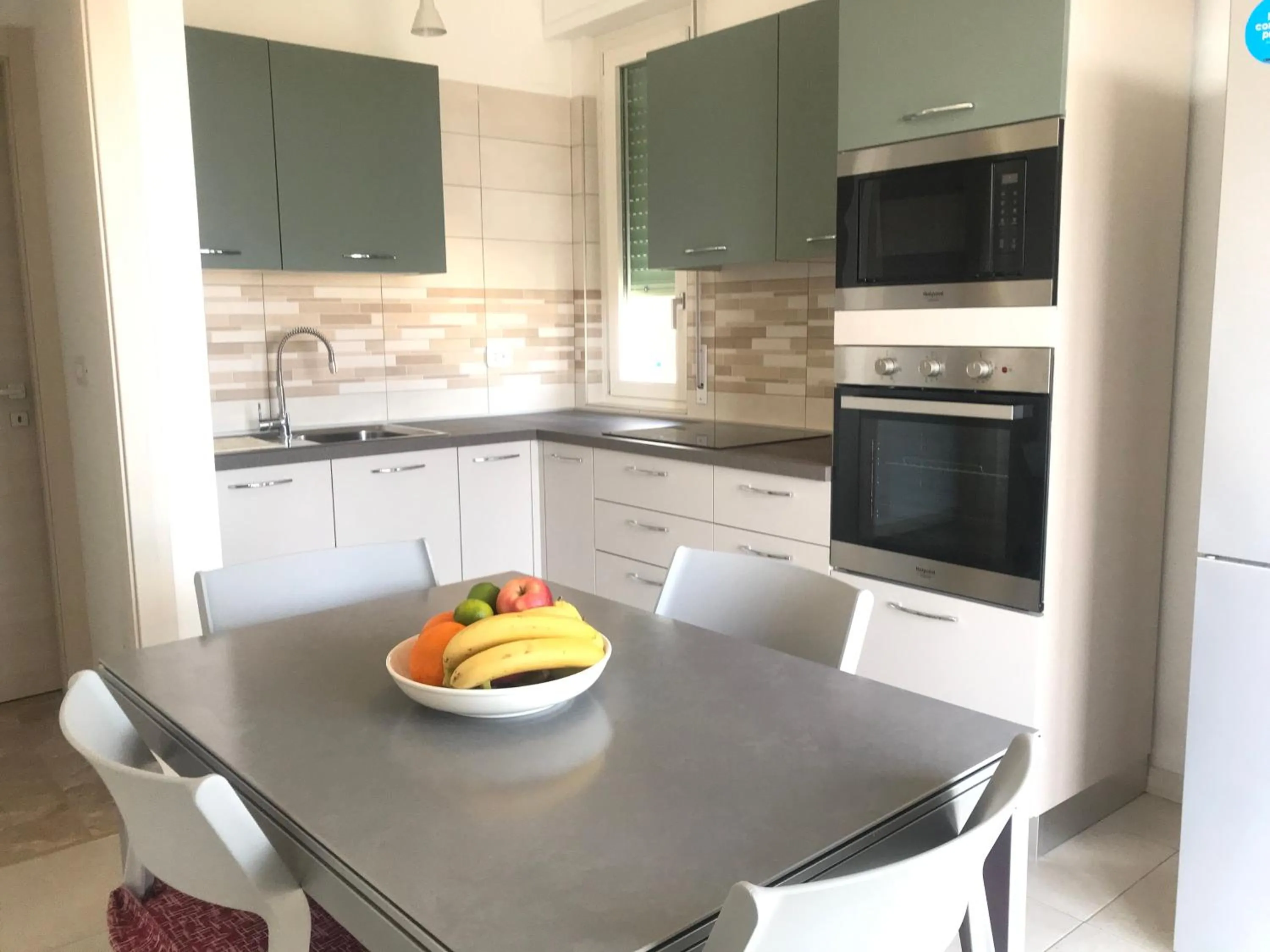 Kitchen or kitchenette in Appartamento Bianco by Holiday World
