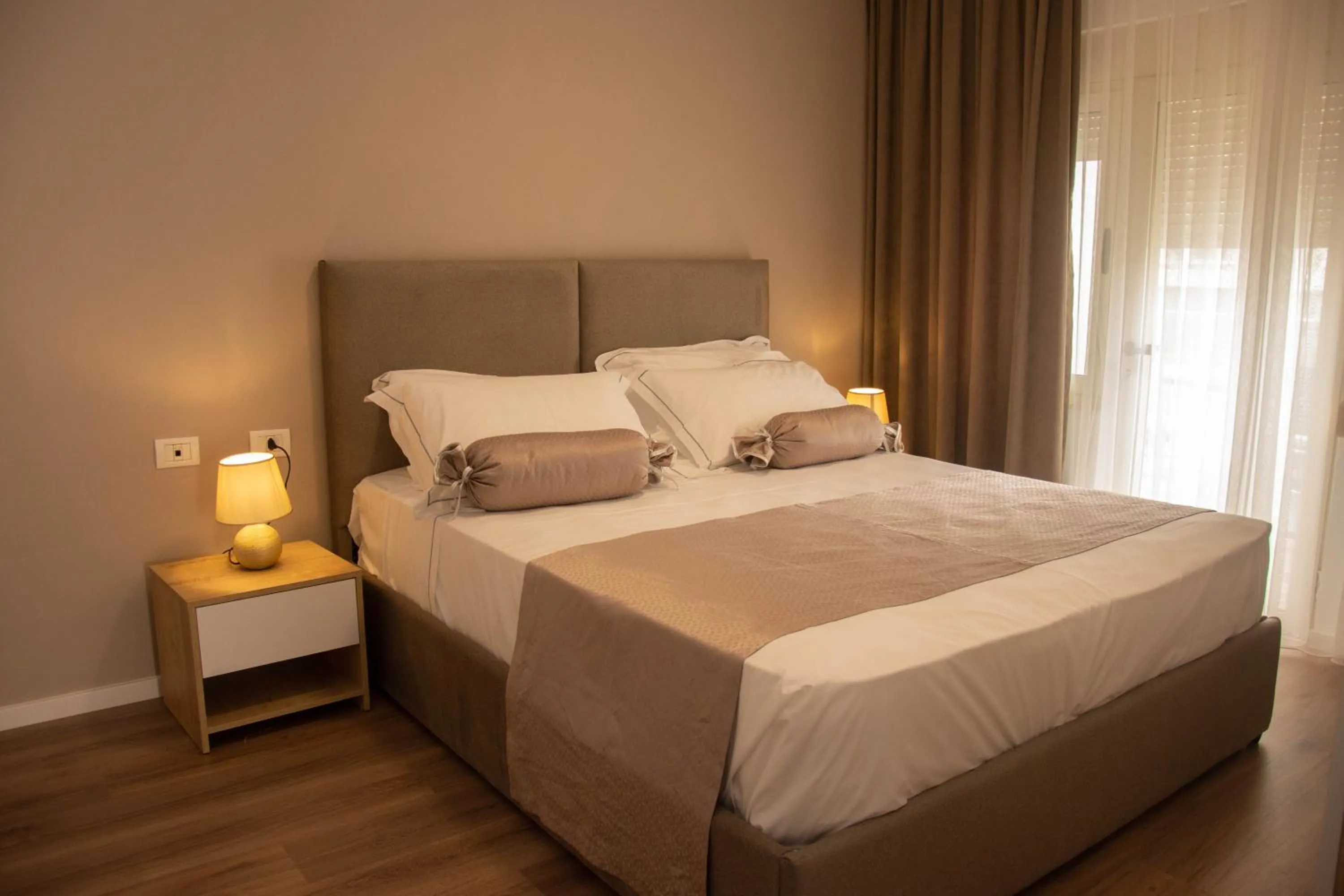 Bed in Wave Beachfront Apartments