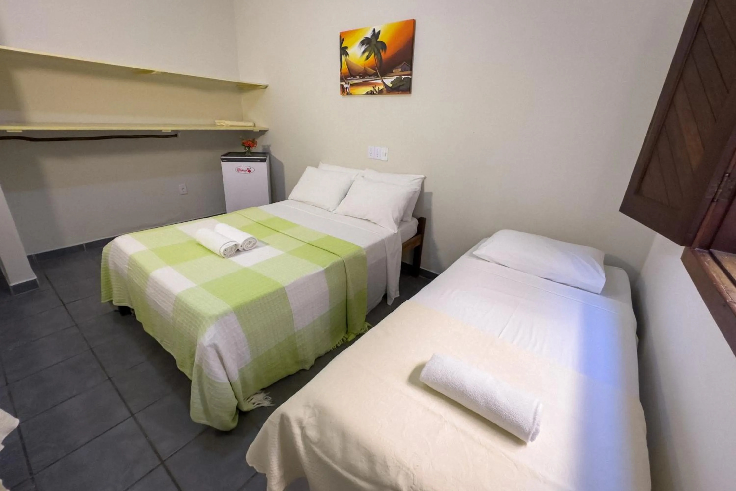 Bed in Pousada Pitanga