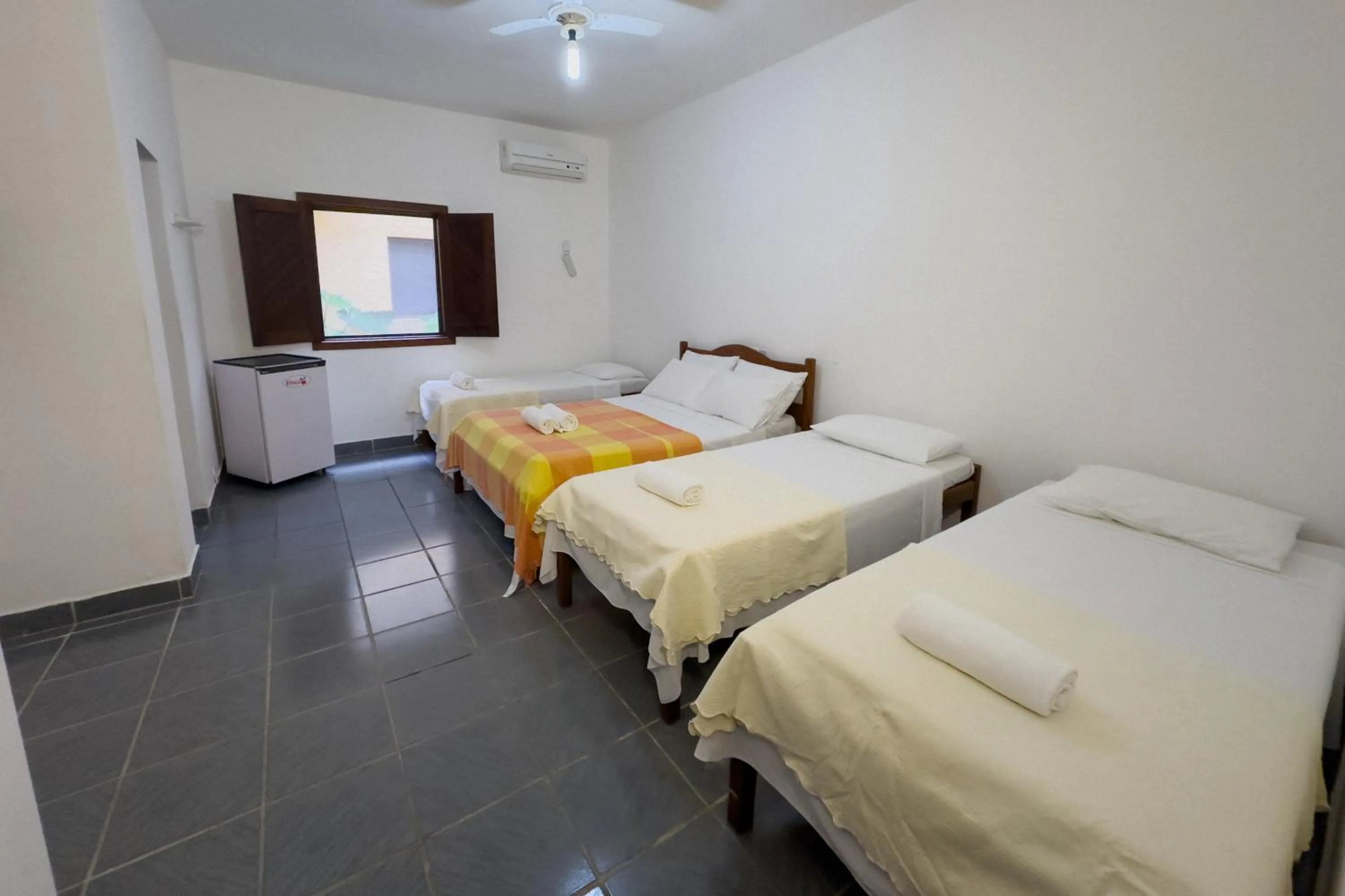 Bed in Pousada Pitanga