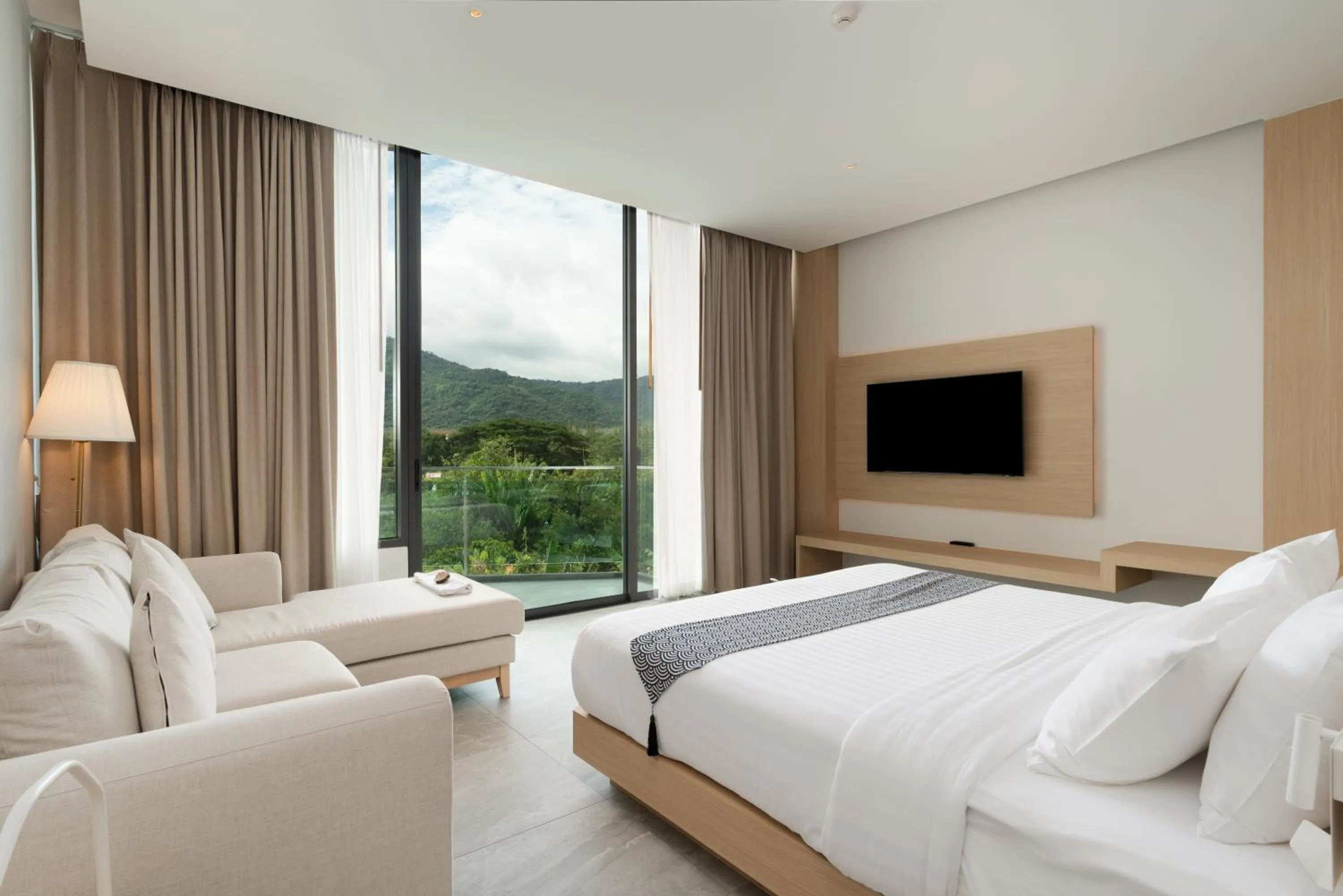 Communal lounge/ TV room, Bed in Timberton Resort Khaoyai