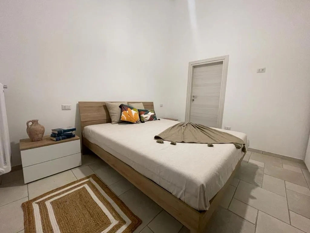 Bed in Maioliche Apartment