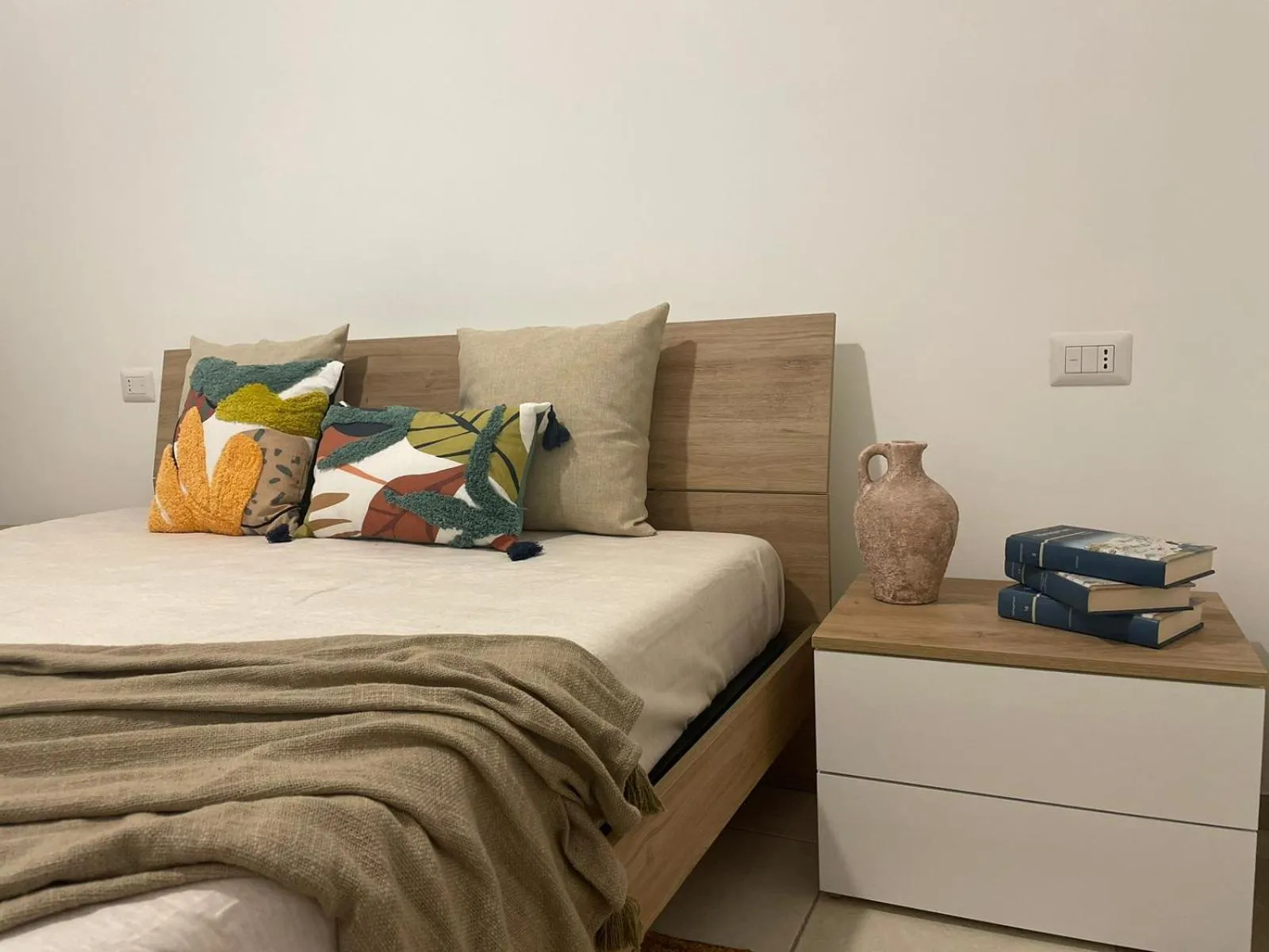 Bed in Maioliche Apartment