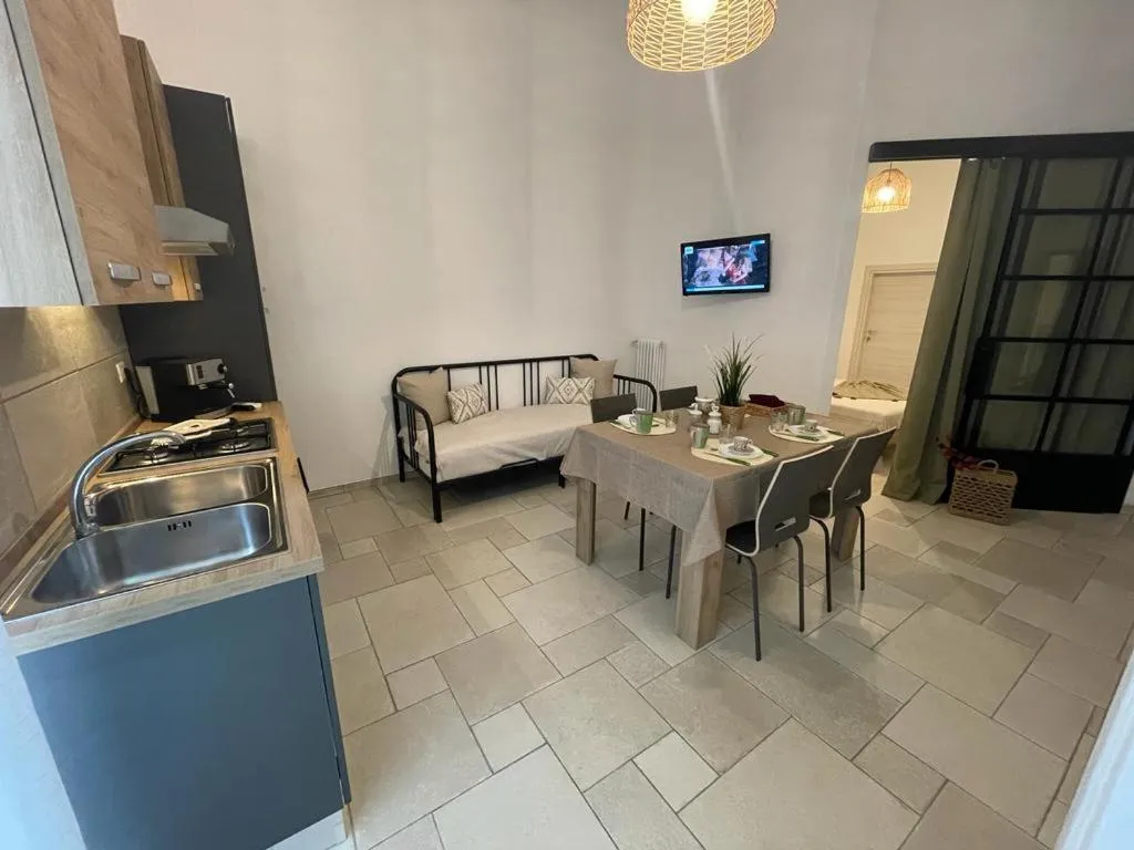 Kitchen or kitchenette in Maioliche Apartment