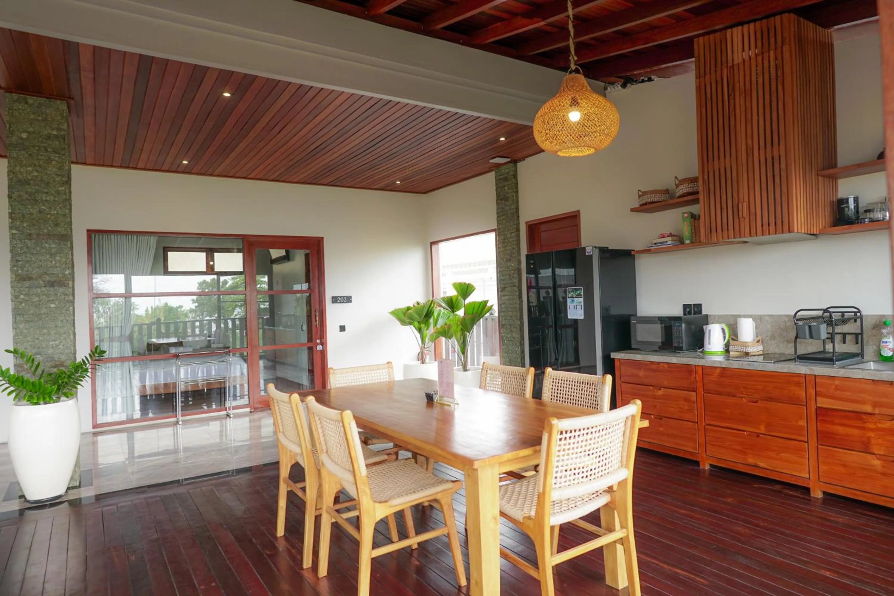 Communal lounge/ TV room in Tropical Beach House Bali