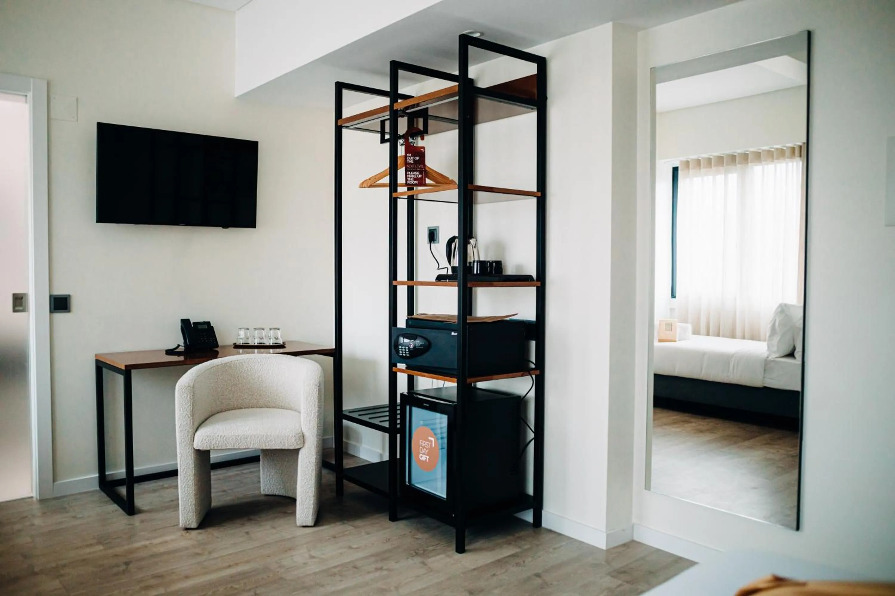 Seating area, Bed in Next Level Premium Hotels